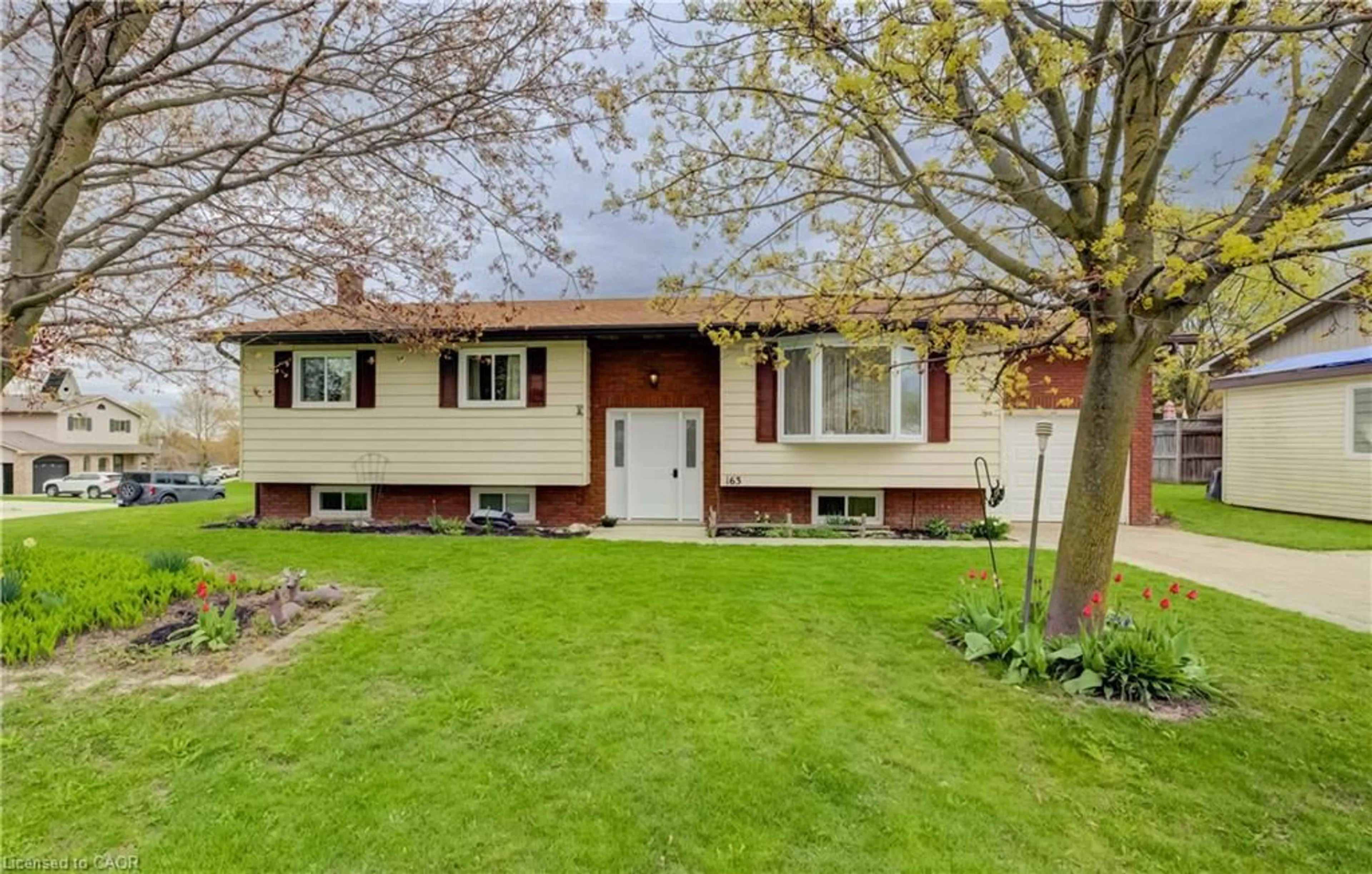 Home with vinyl exterior material, street for 163 13th A Ave, Hanover Ontario N4N 3P5