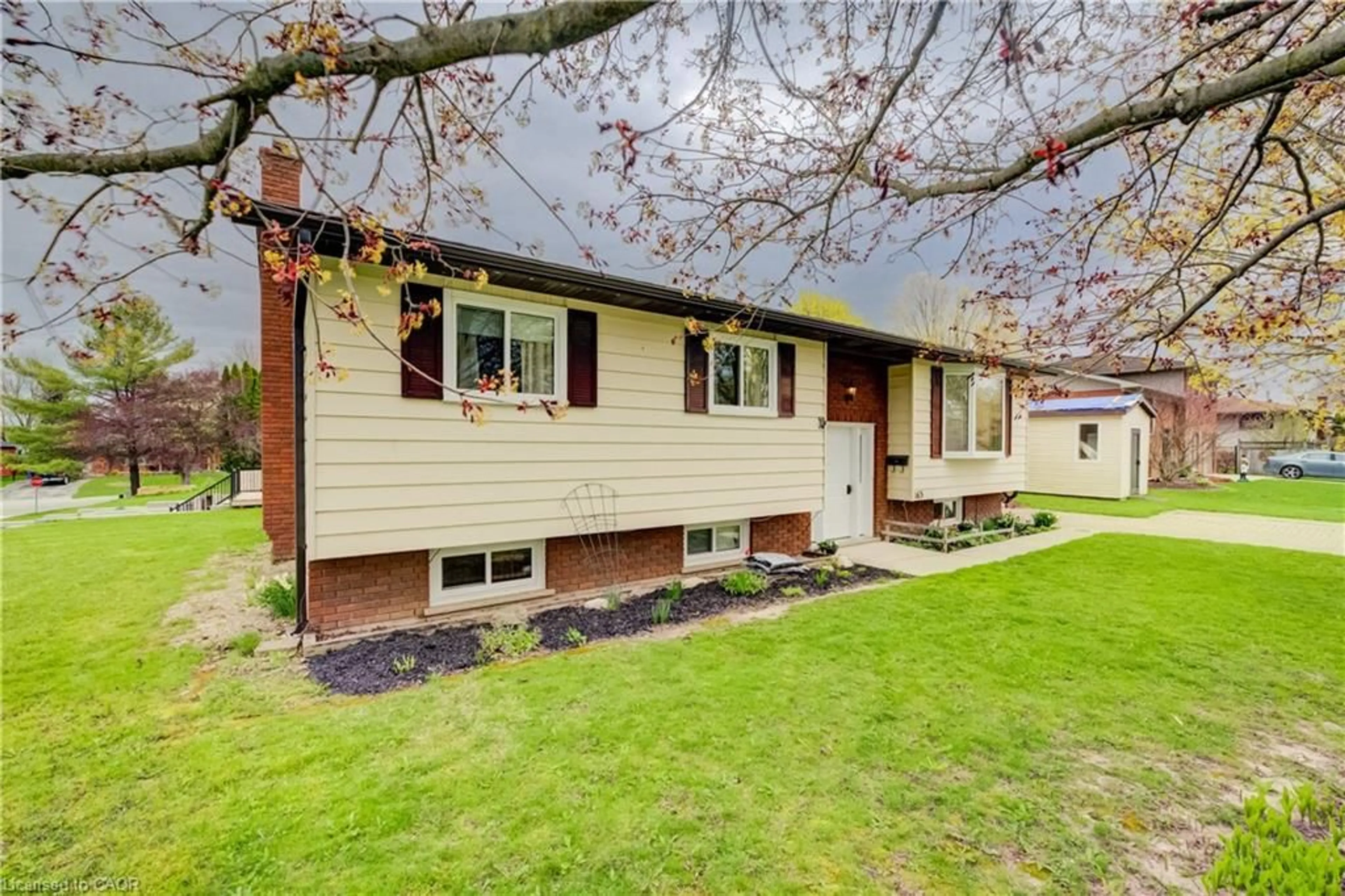 Home with vinyl exterior material, street for 163 13th A Ave, Hanover Ontario N4N 3P5