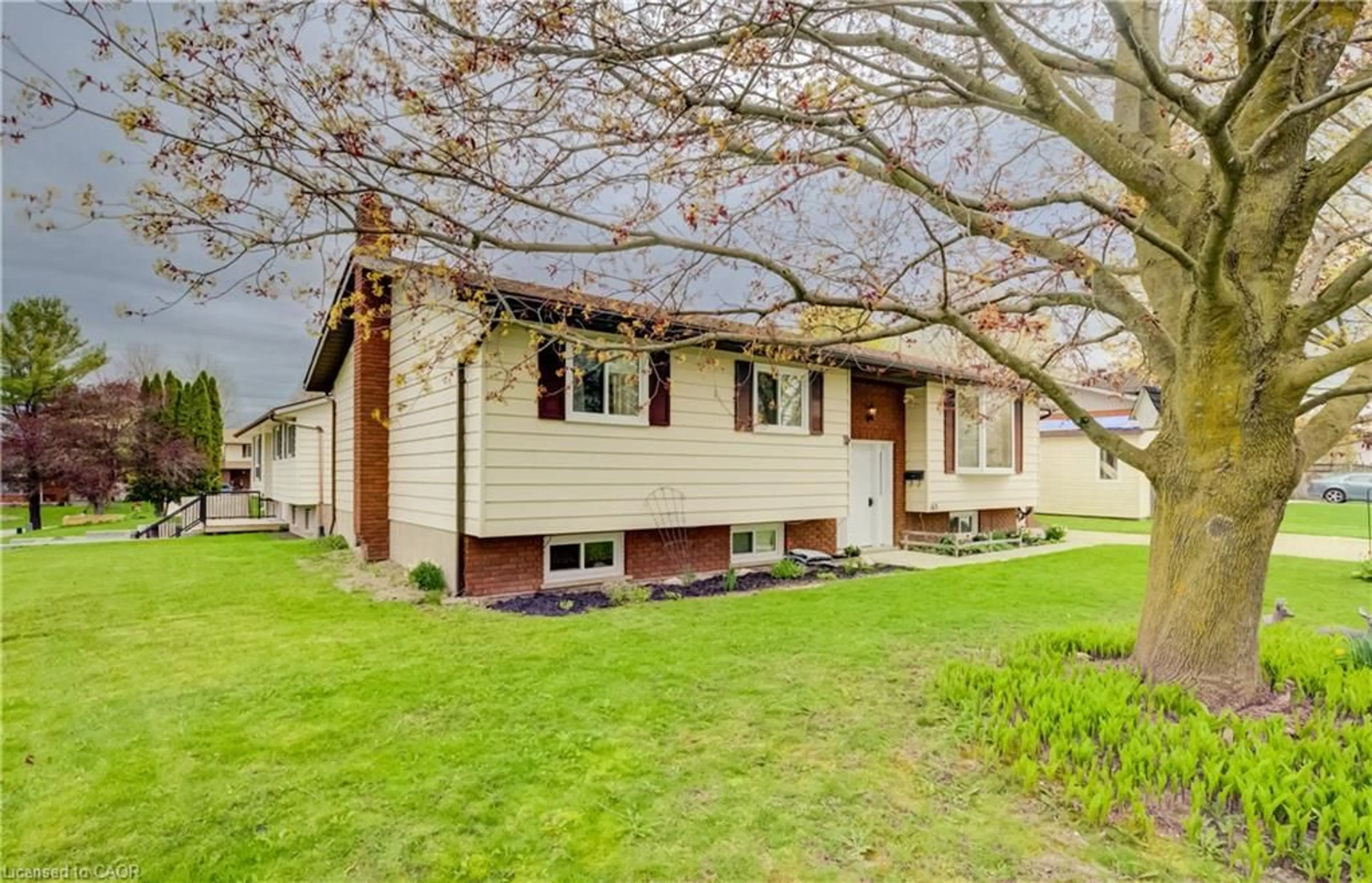 Home with vinyl exterior material, street for 163 13th A Ave, Hanover Ontario N4N 3P5
