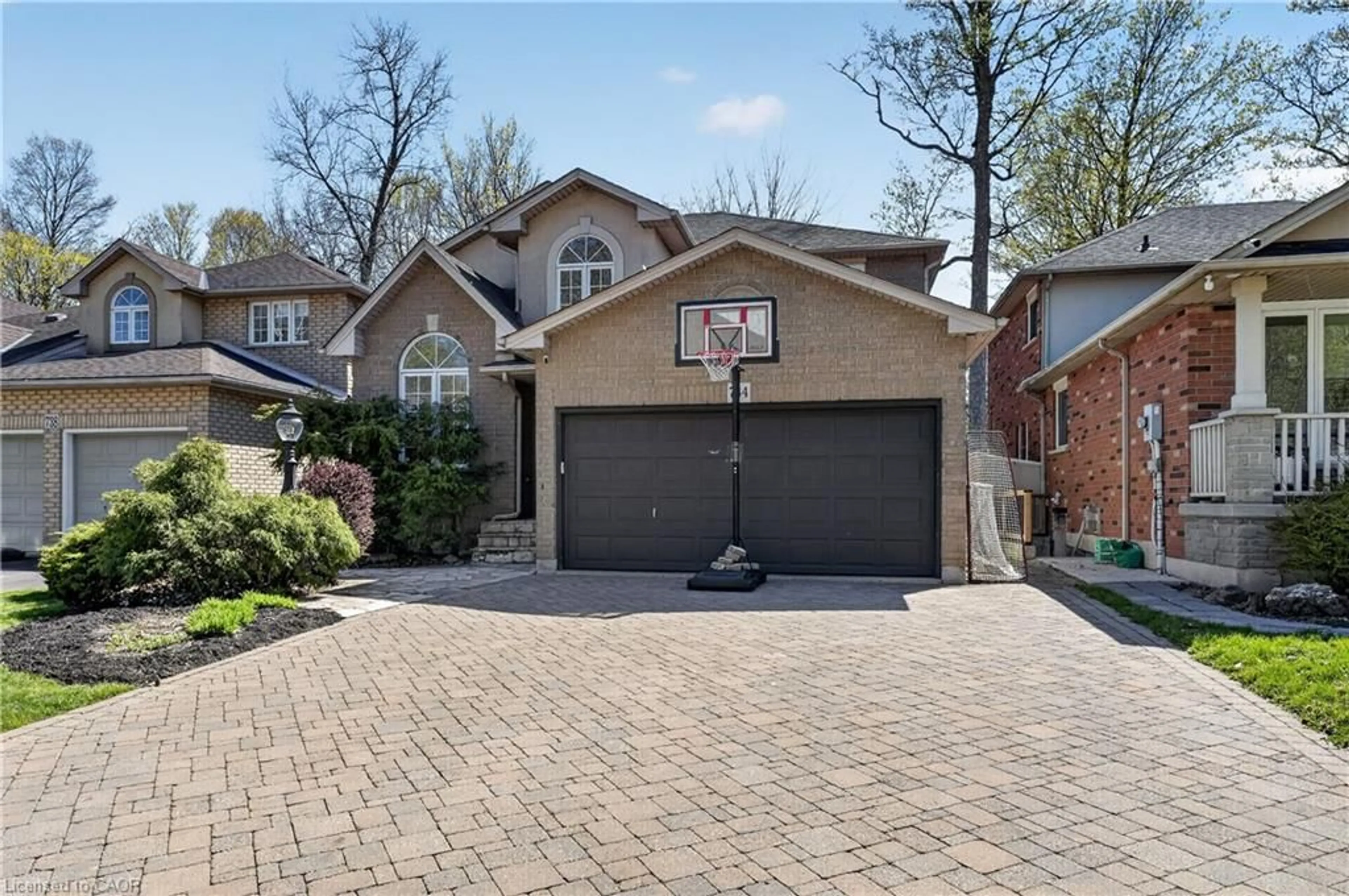 Home with brick exterior material, street for 734 Brigadoon Dr, Hamilton Ontario L9C 7S2