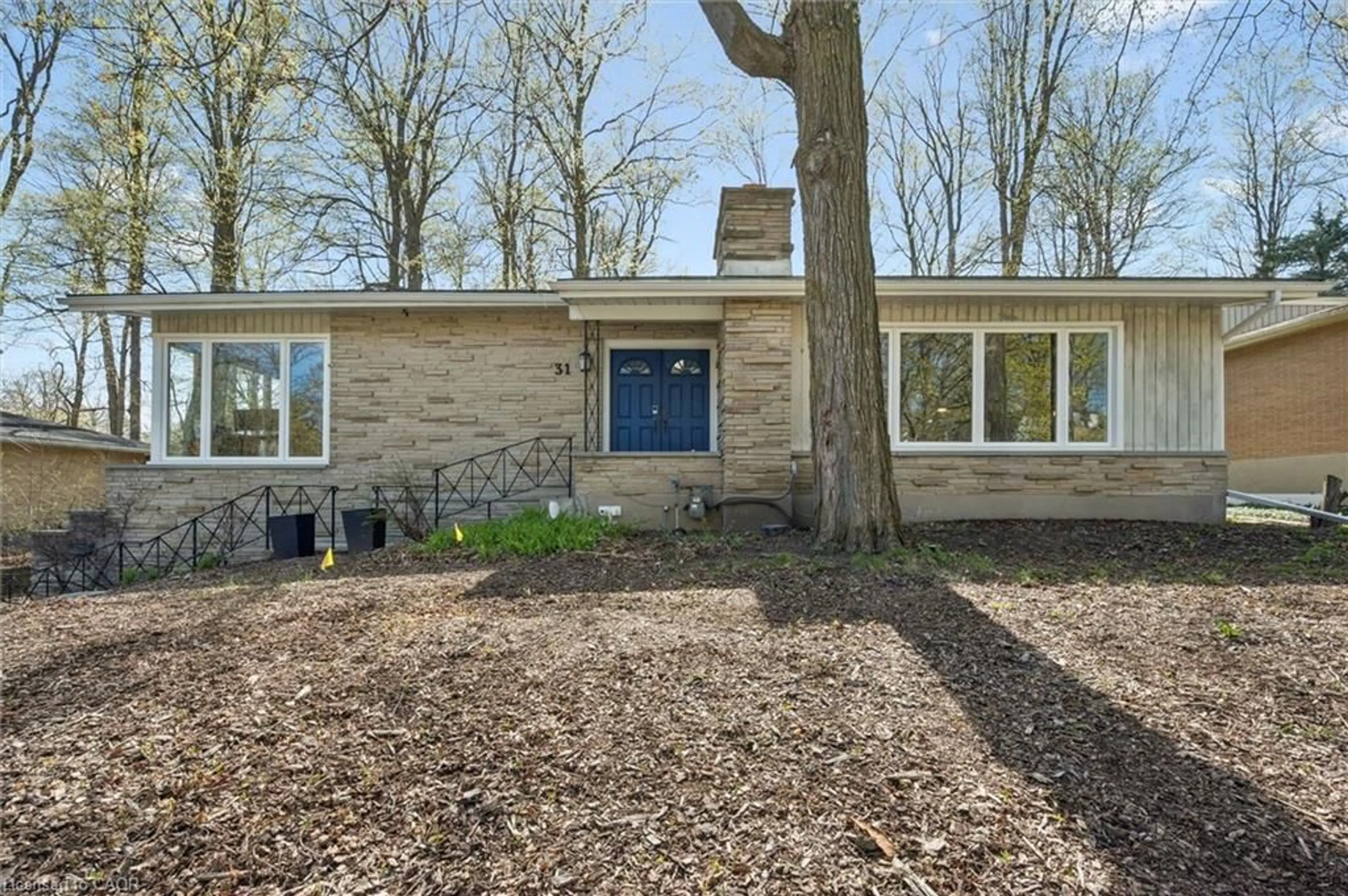 Home with brick exterior material, street for 31 Forest Hill Dr, Kitchener Ontario N2M 4G2