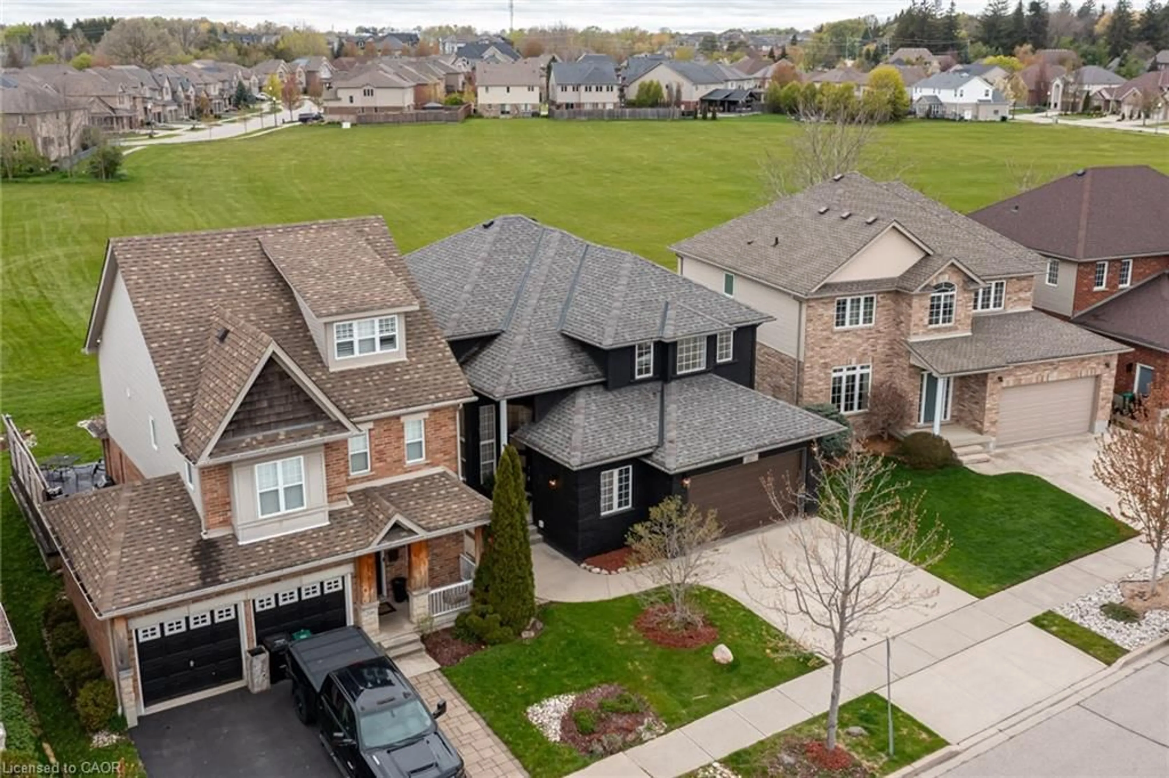 A pic from outside/outdoor area/front of a property/back of a property/a pic from drone, street for 210 Hawkswood Dr, Kitchener Ontario N2K 4J3