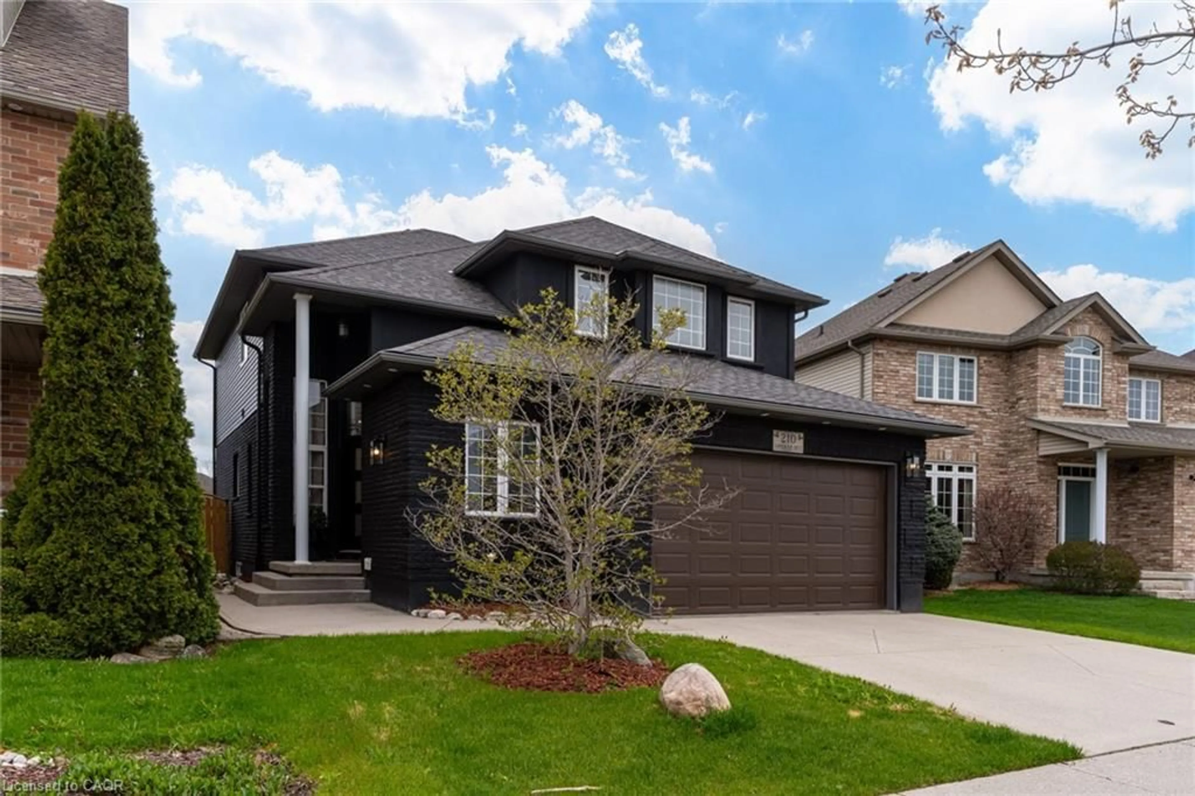 Home with brick exterior material, street for 210 Hawkswood Dr, Kitchener Ontario N2K 4J3