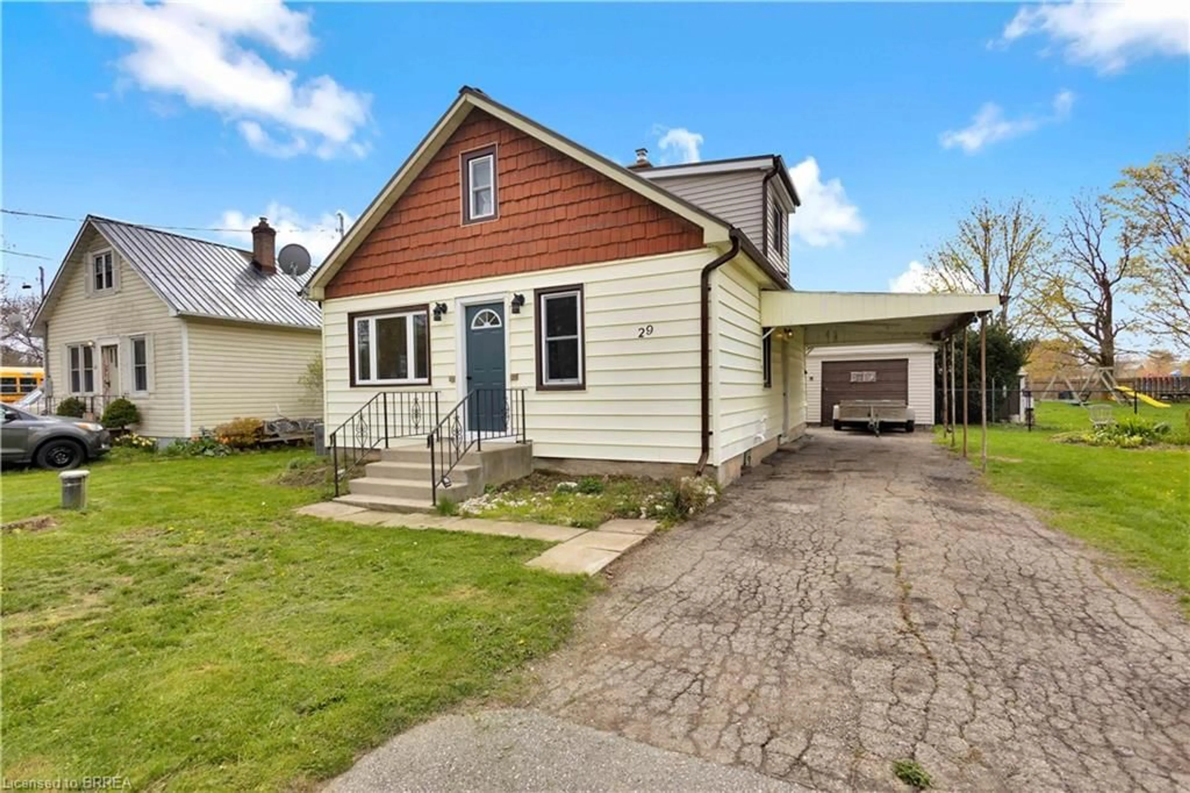 Home with vinyl exterior material, street for 29 Alexander St, Burford Ontario N0E 1A0