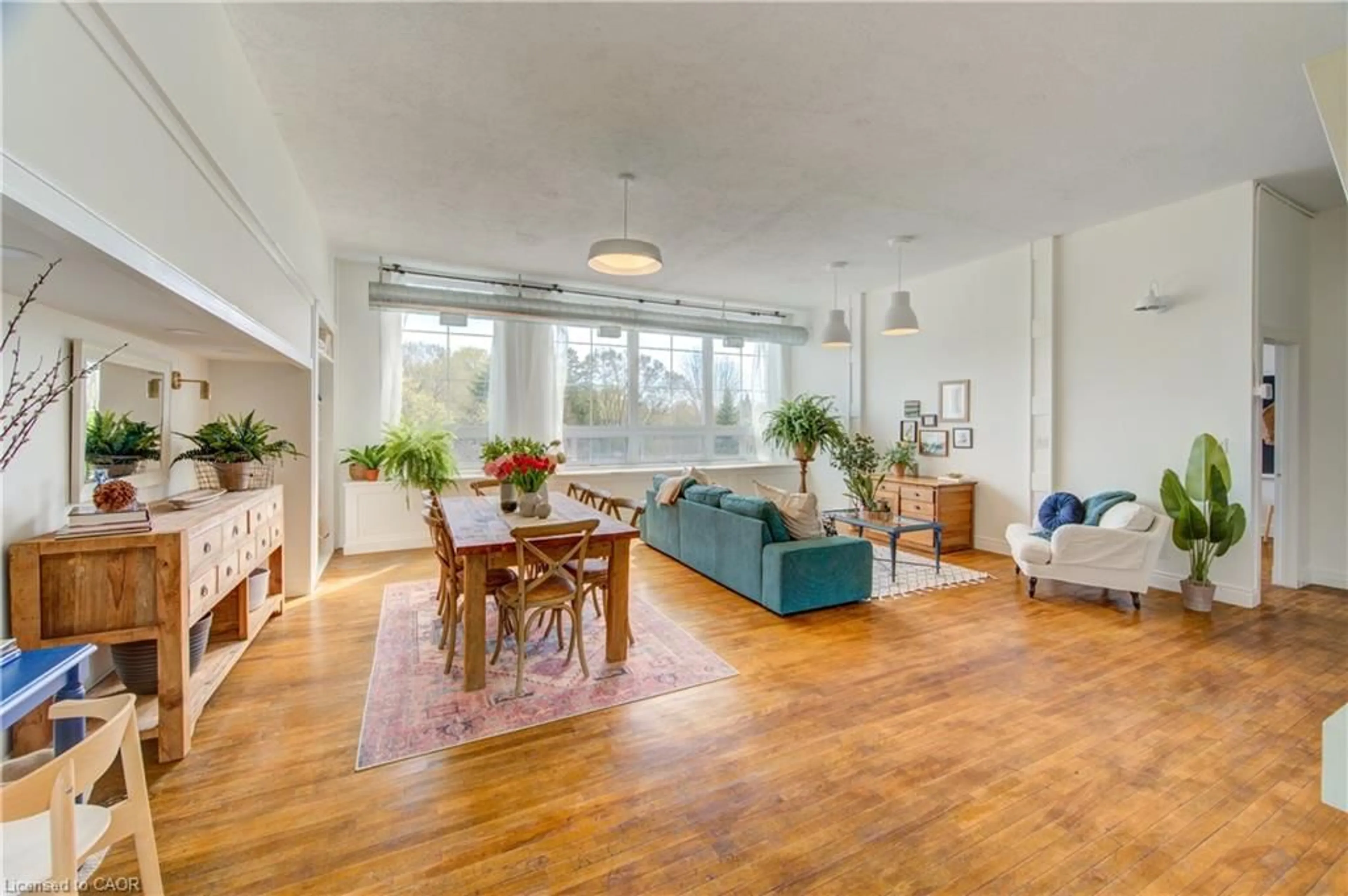 Living room with furniture, unknown for 27 Chapel St #202, Woodstock Ontario N4S 3R5