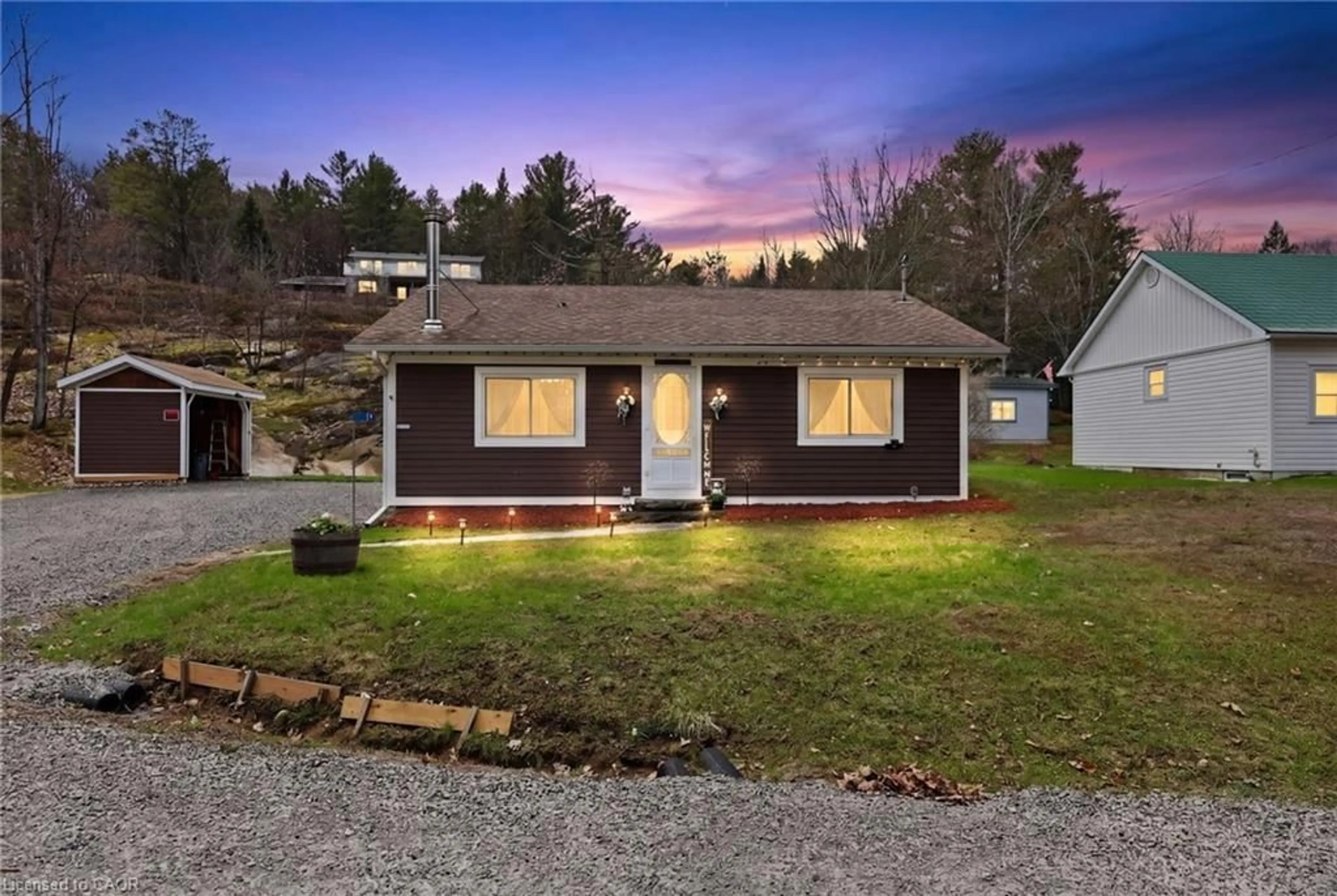 Home with vinyl exterior material, street for 17 Mcclure Lane, Port Sydney Ontario P0B 1L0