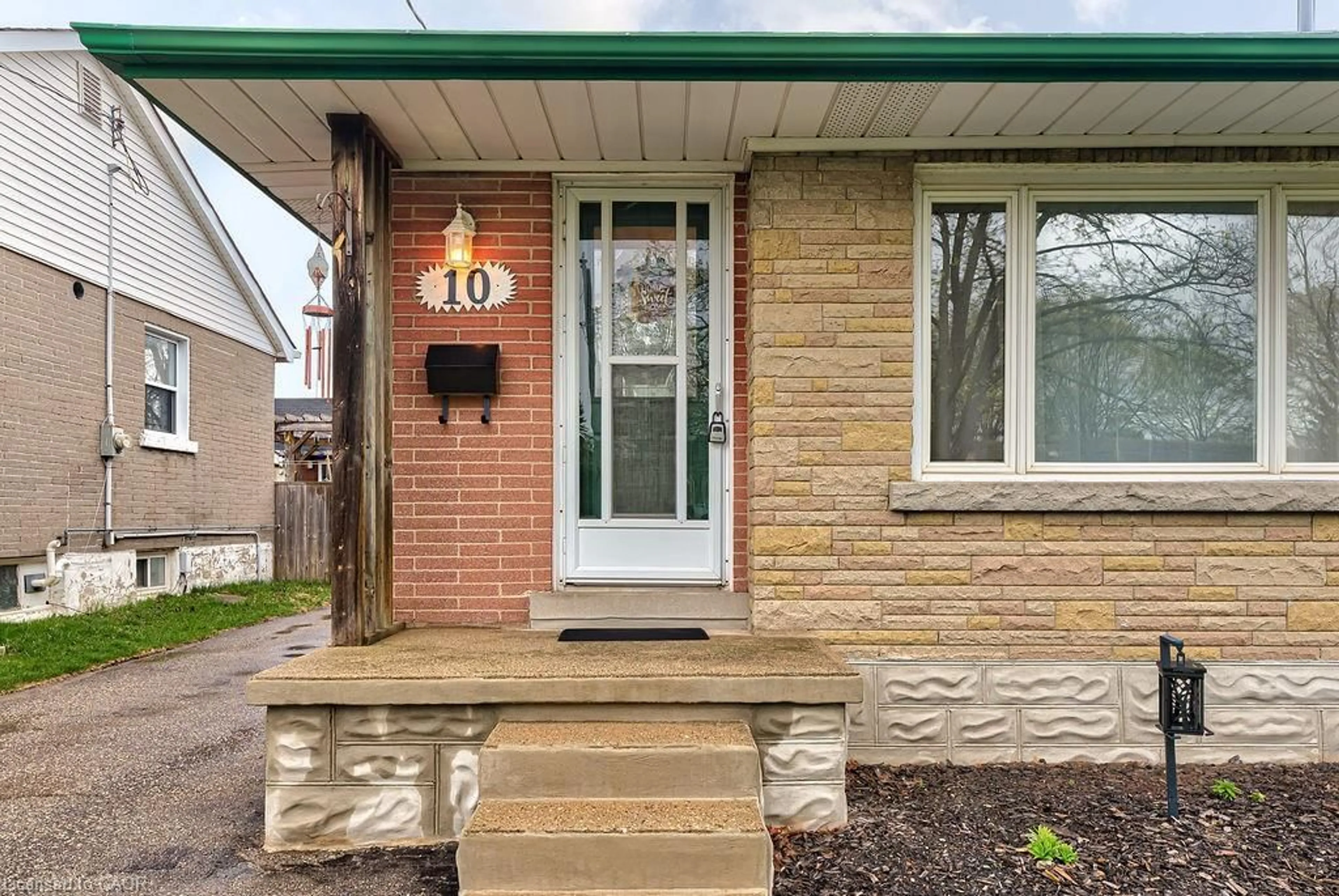 Home with brick exterior material, street for 10 Elmwood Ave, Kitchener Ontario N2H 6G4