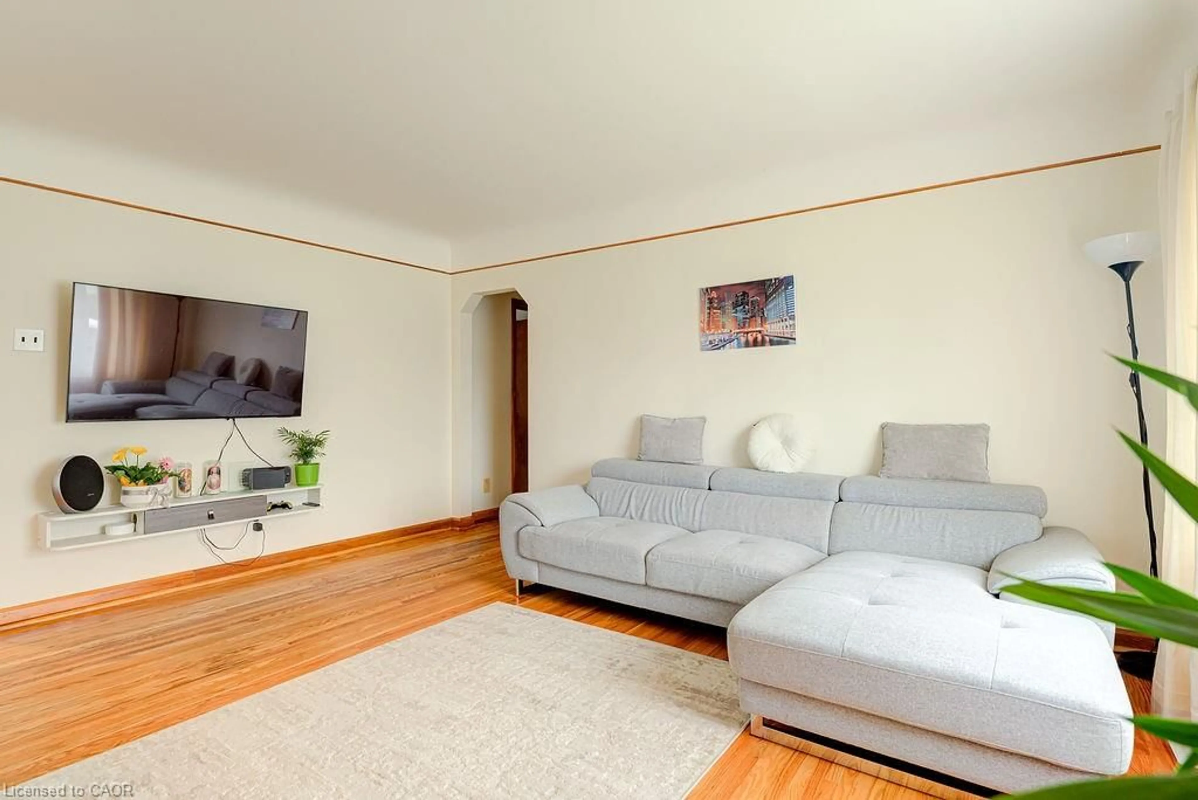 Living room with furniture, wood/laminate floor for 10 Elmwood Ave, Kitchener Ontario N2H 6G4