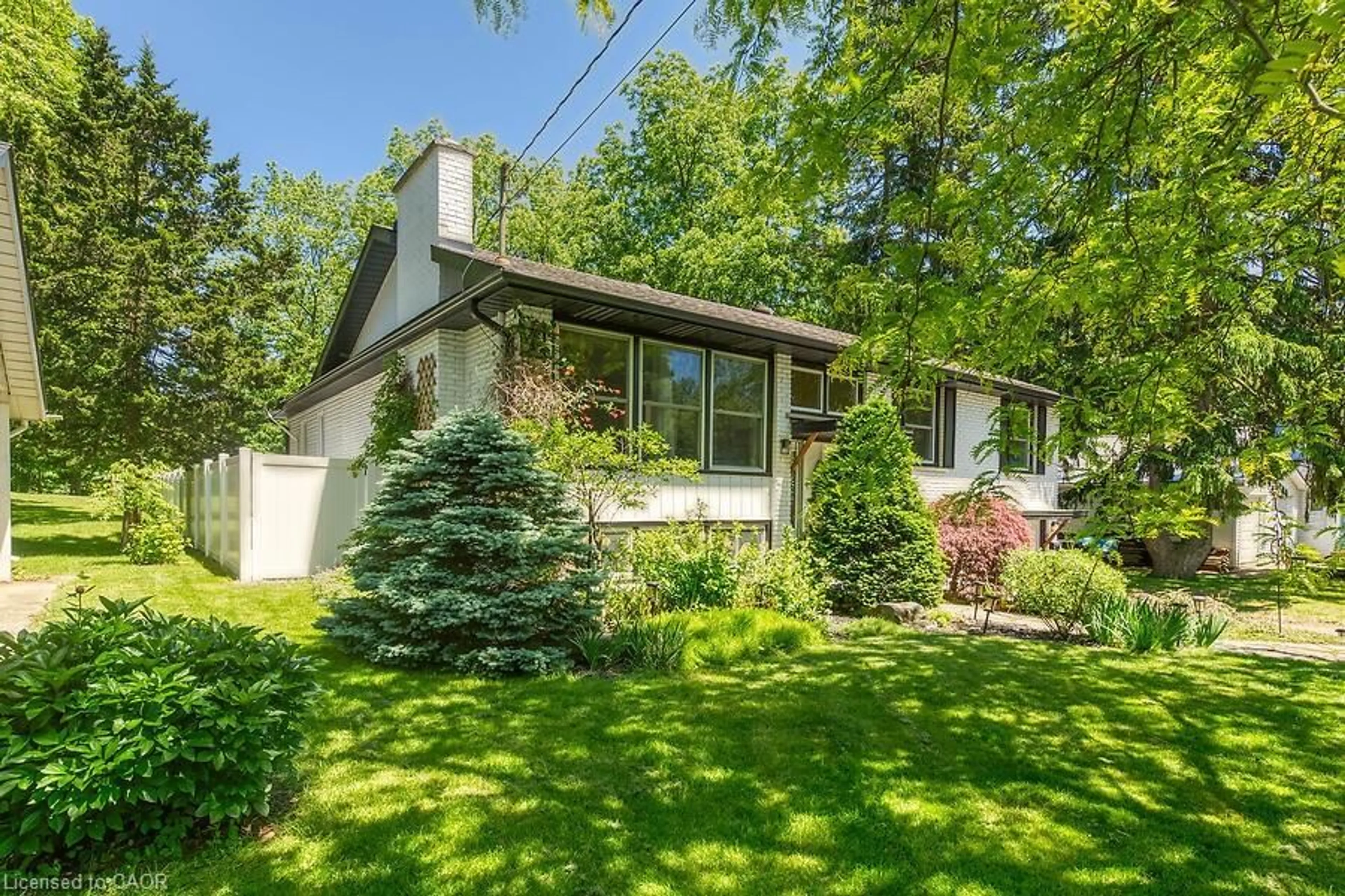 Home with vinyl exterior material, street for 486 Winniett St, Caledonia Ontario N3W 1E4