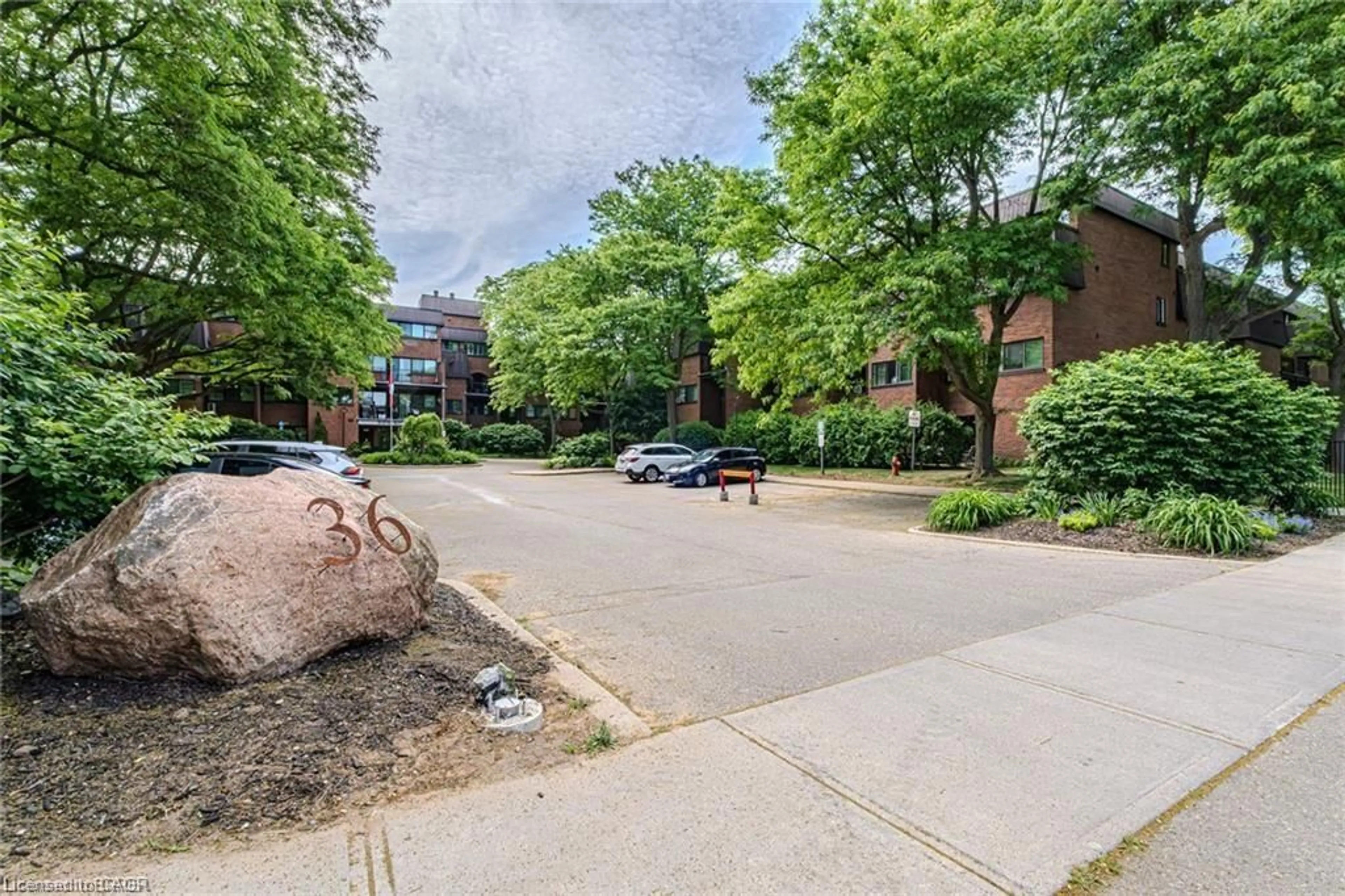 A pic from outside/outdoor area/front of a property/back of a property/a pic from drone, street for 36 Hayhurst Rd #334, Brantford Ontario N3R 6Y9