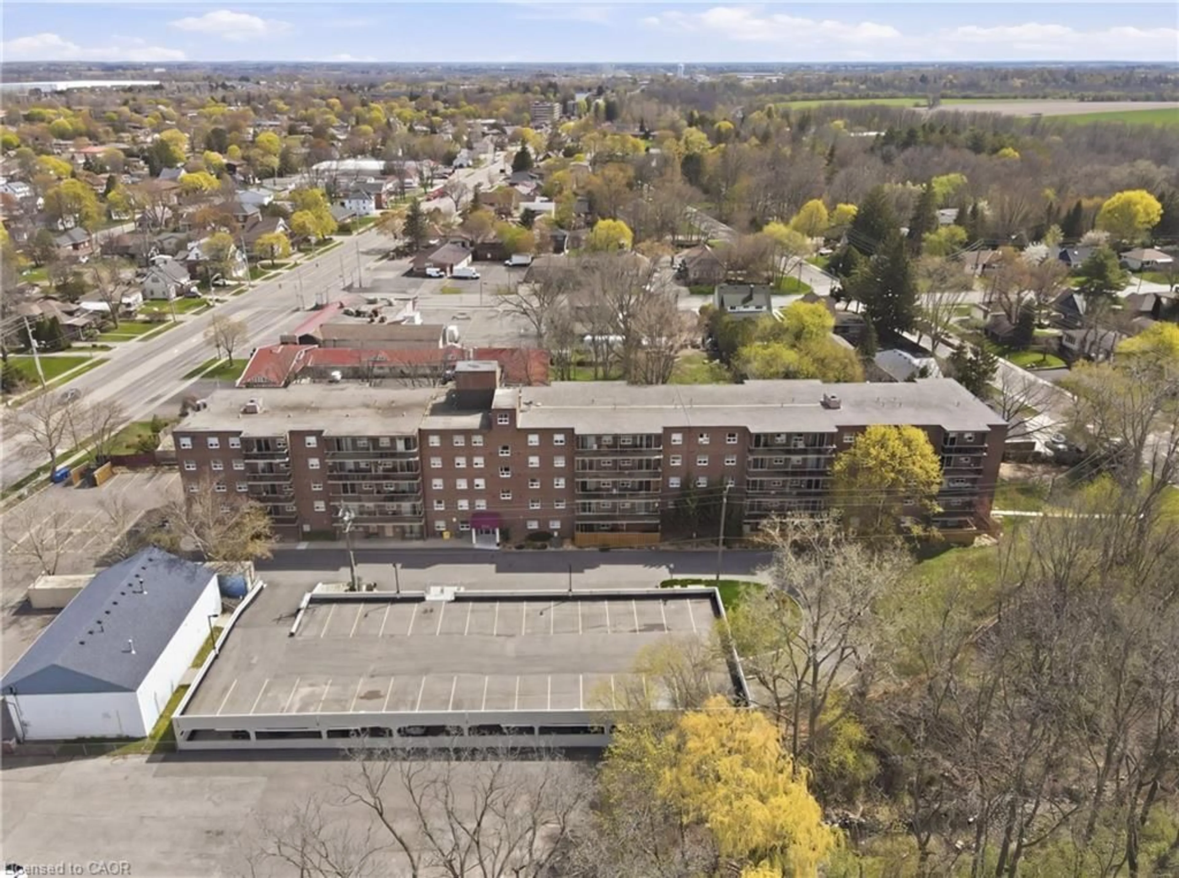 A pic from outside/outdoor area/front of a property/back of a property/a pic from drone, unknown for 793 Colborne St #512, Brantford Ontario N3S 7J3