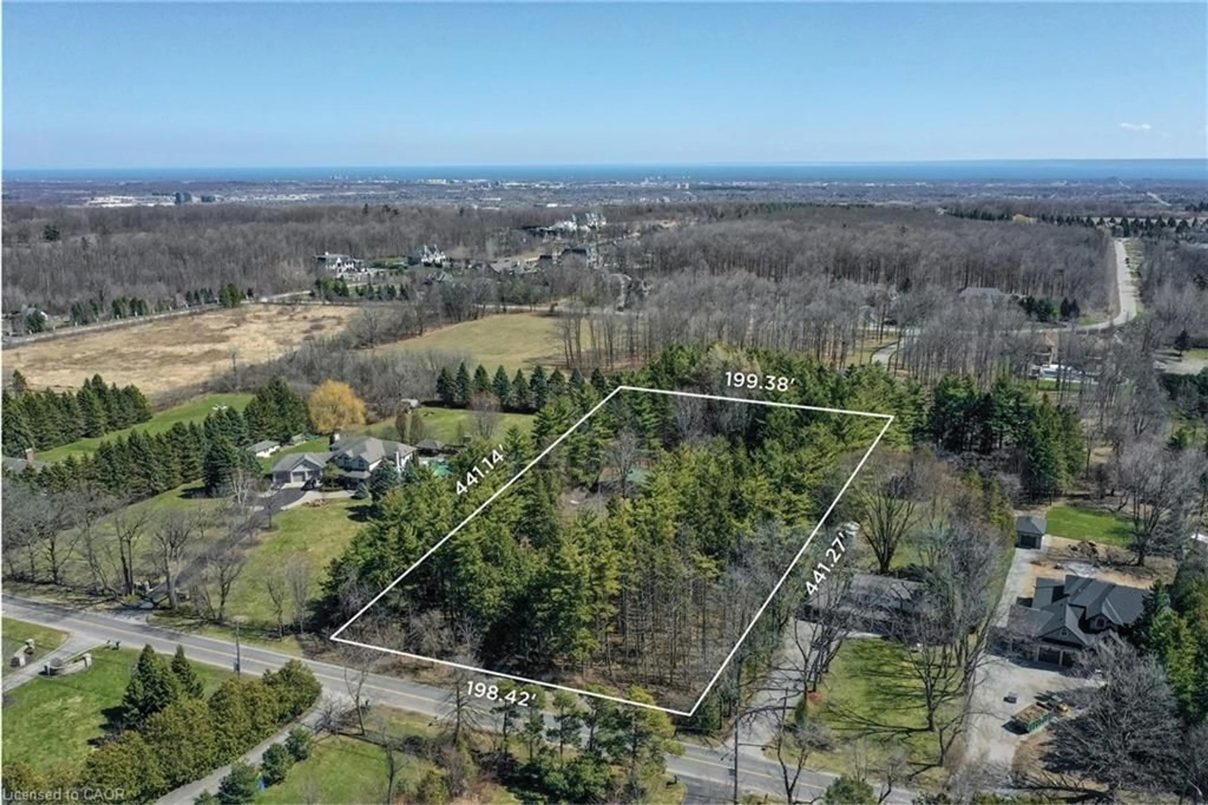 A pic from outside/outdoor area/front of a property/back of a property/a pic from drone, forest/trees view for 2602 No 2 Side Rd, Burlington Ontario L7M 0T1