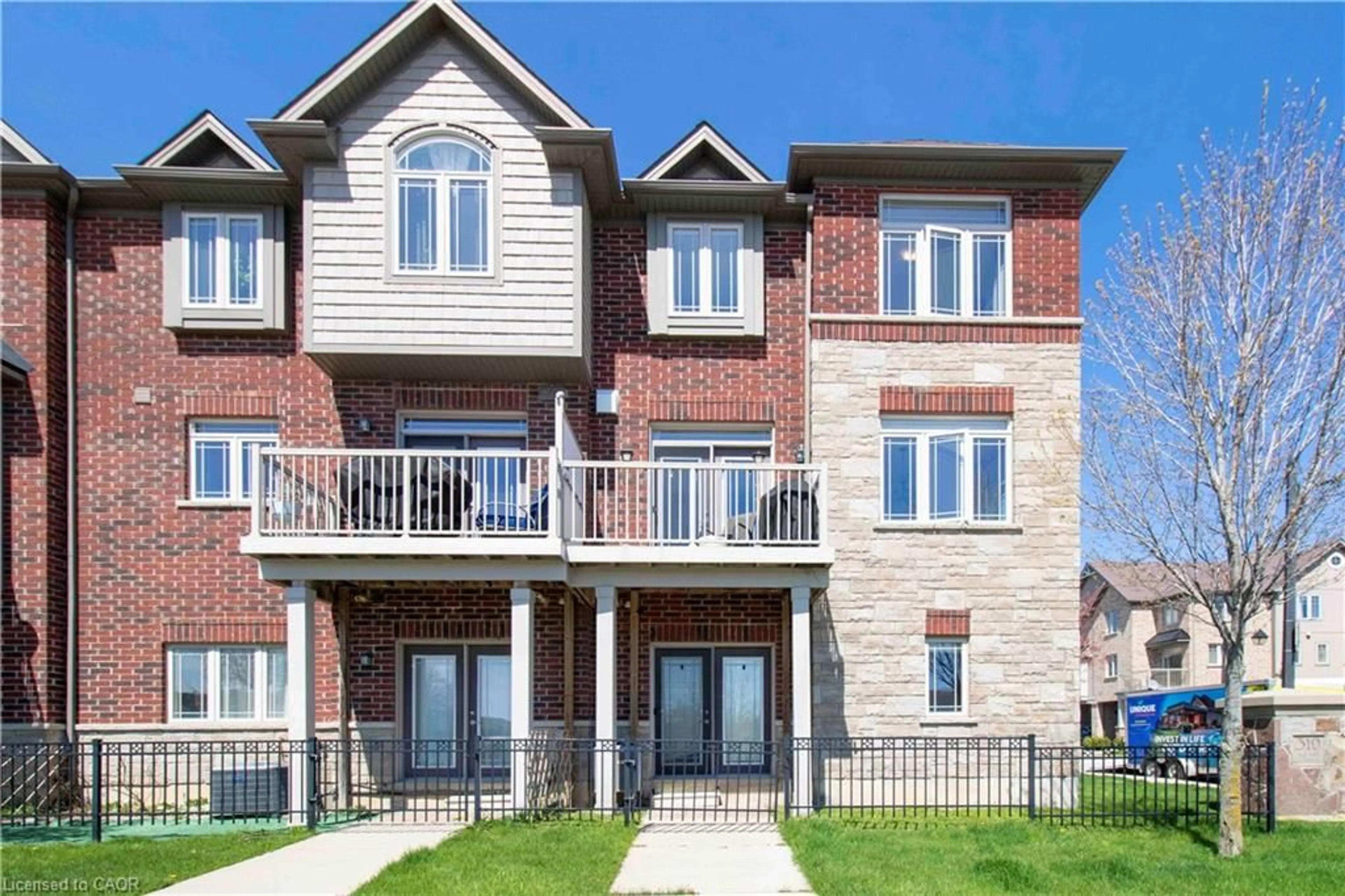 Home with brick exterior material, unknown for 310 Fall Fair Way #71, Binbrook Ontario L0R 1C0