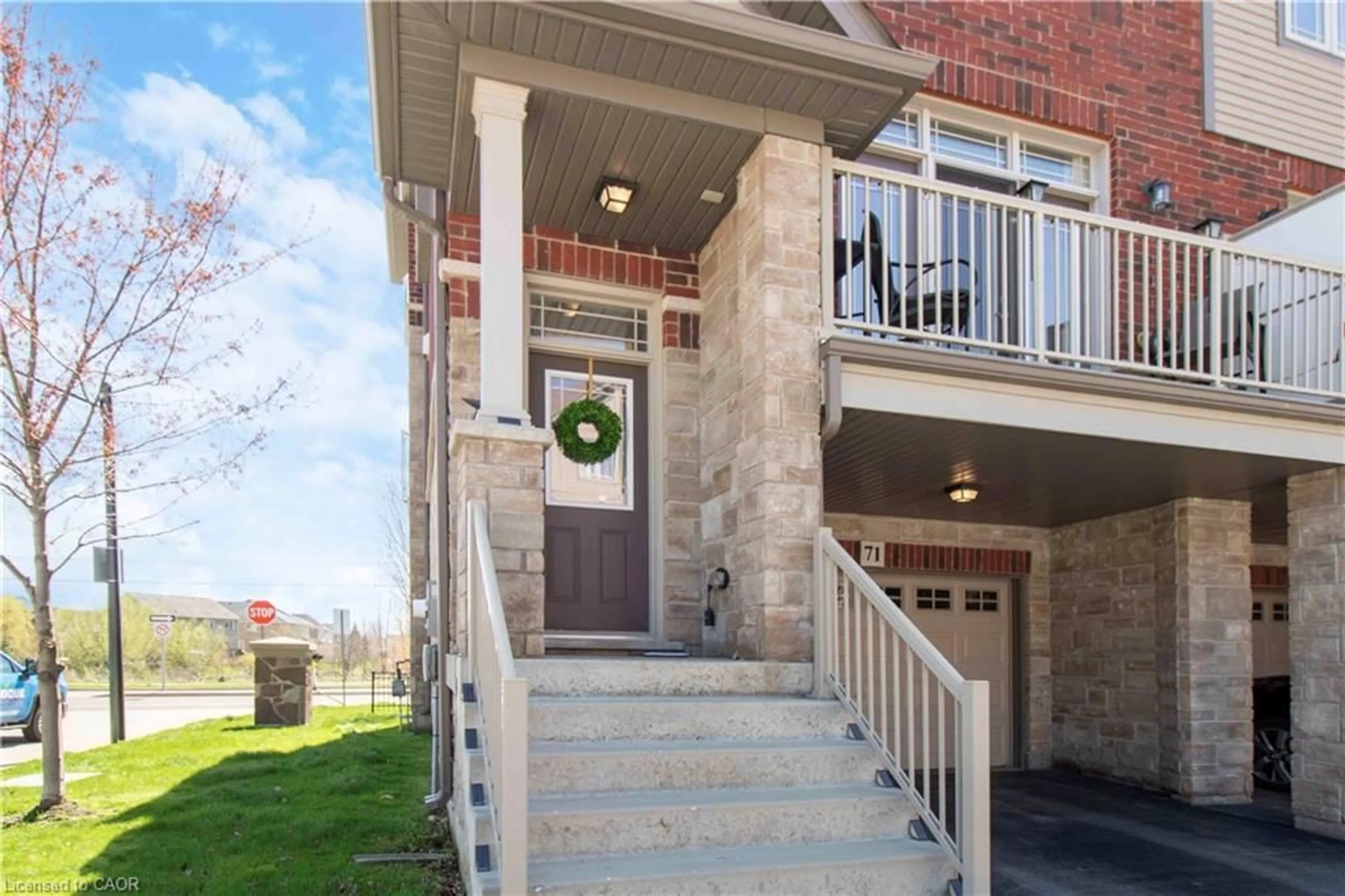 Home with brick exterior material, street for 310 Fall Fair Way #71, Binbrook Ontario L0R 1C0