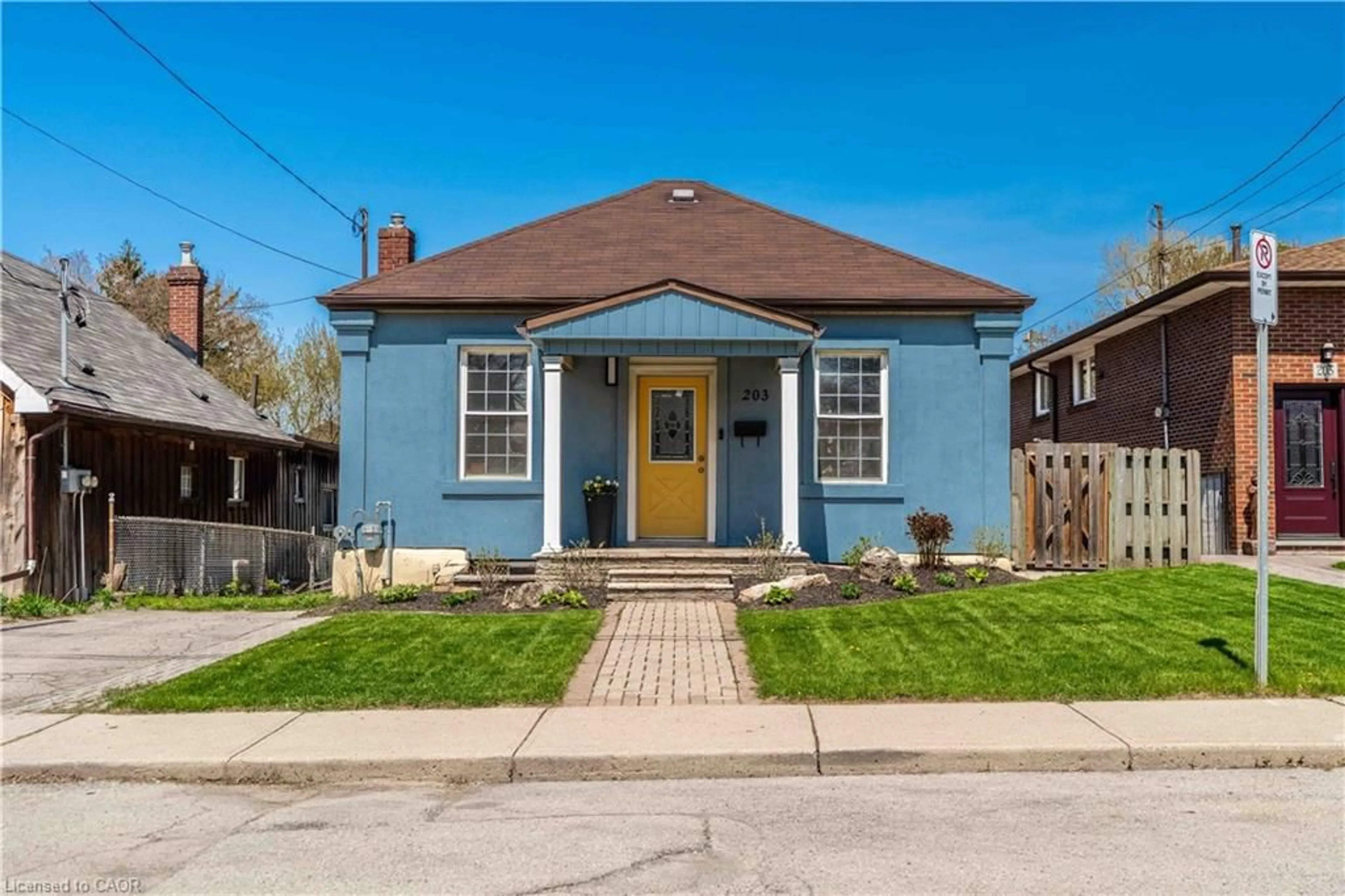 Home with brick exterior material, street for 203 Wood St, Hamilton Ontario L8L 3Z2
