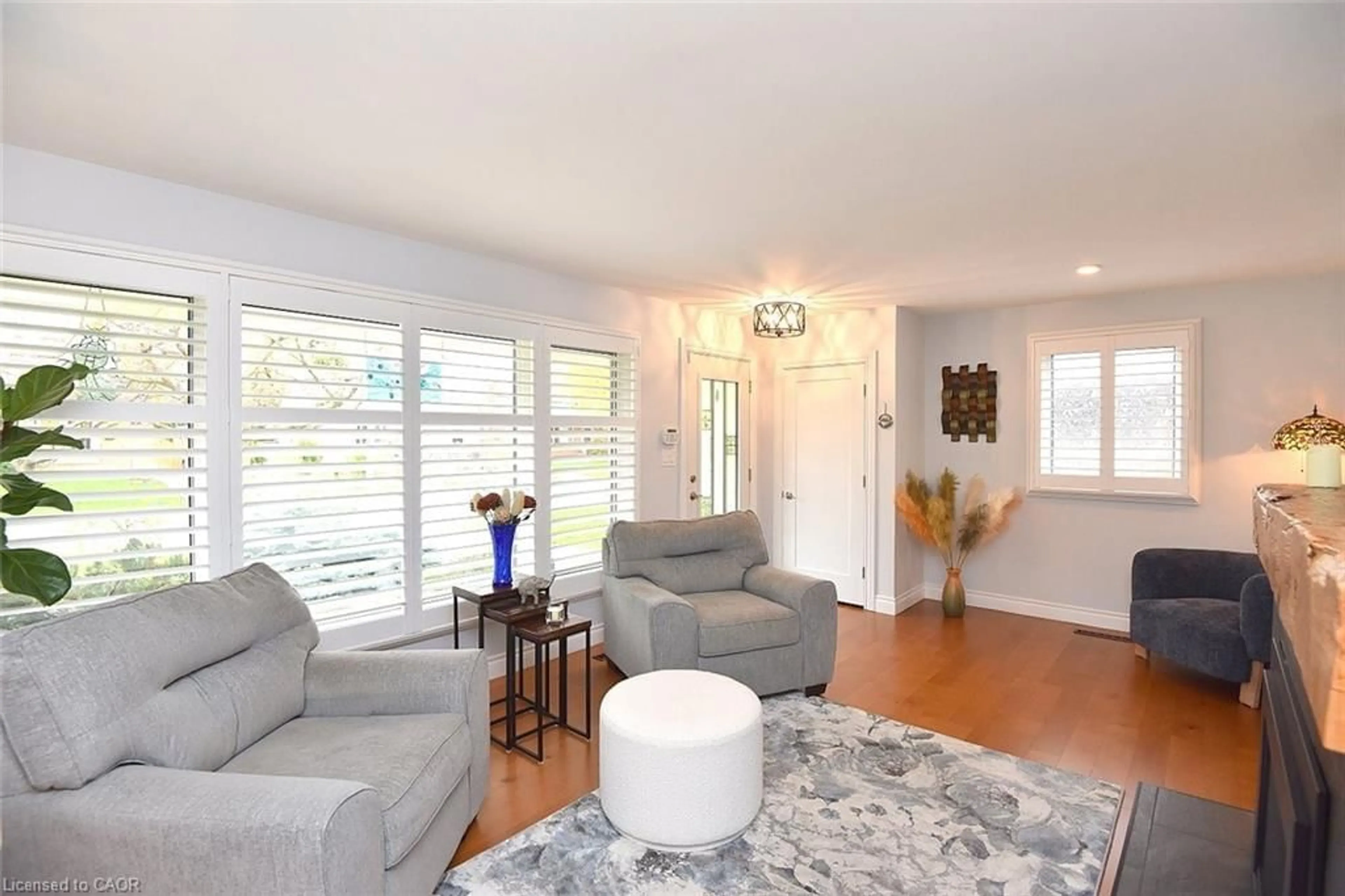 Living room with furniture, wood/laminate floor for 12 Desjardins Ave, Dundas Ontario L9H 4P9