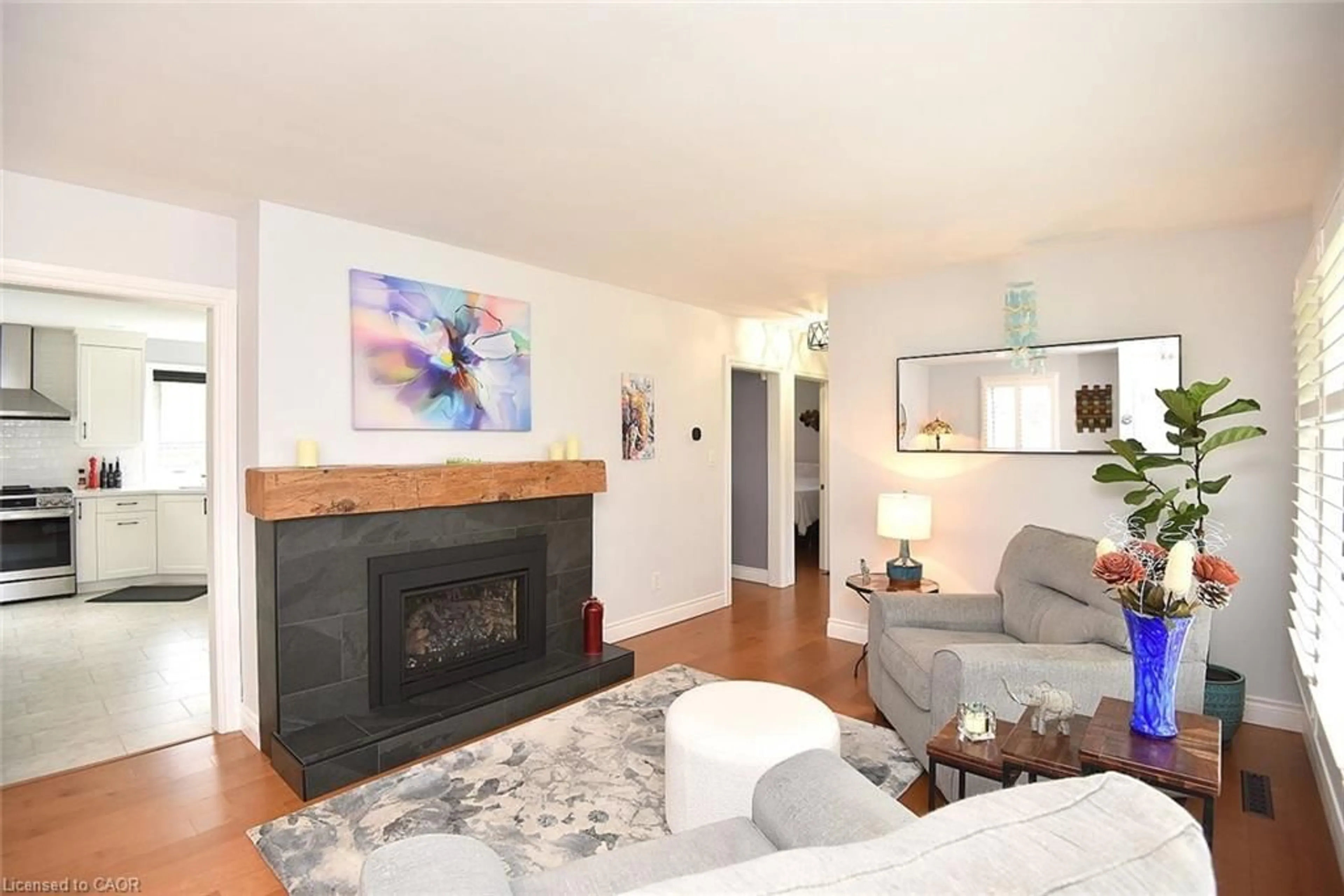 Living room with furniture, wood/laminate floor for 12 Desjardins Ave, Dundas Ontario L9H 4P9