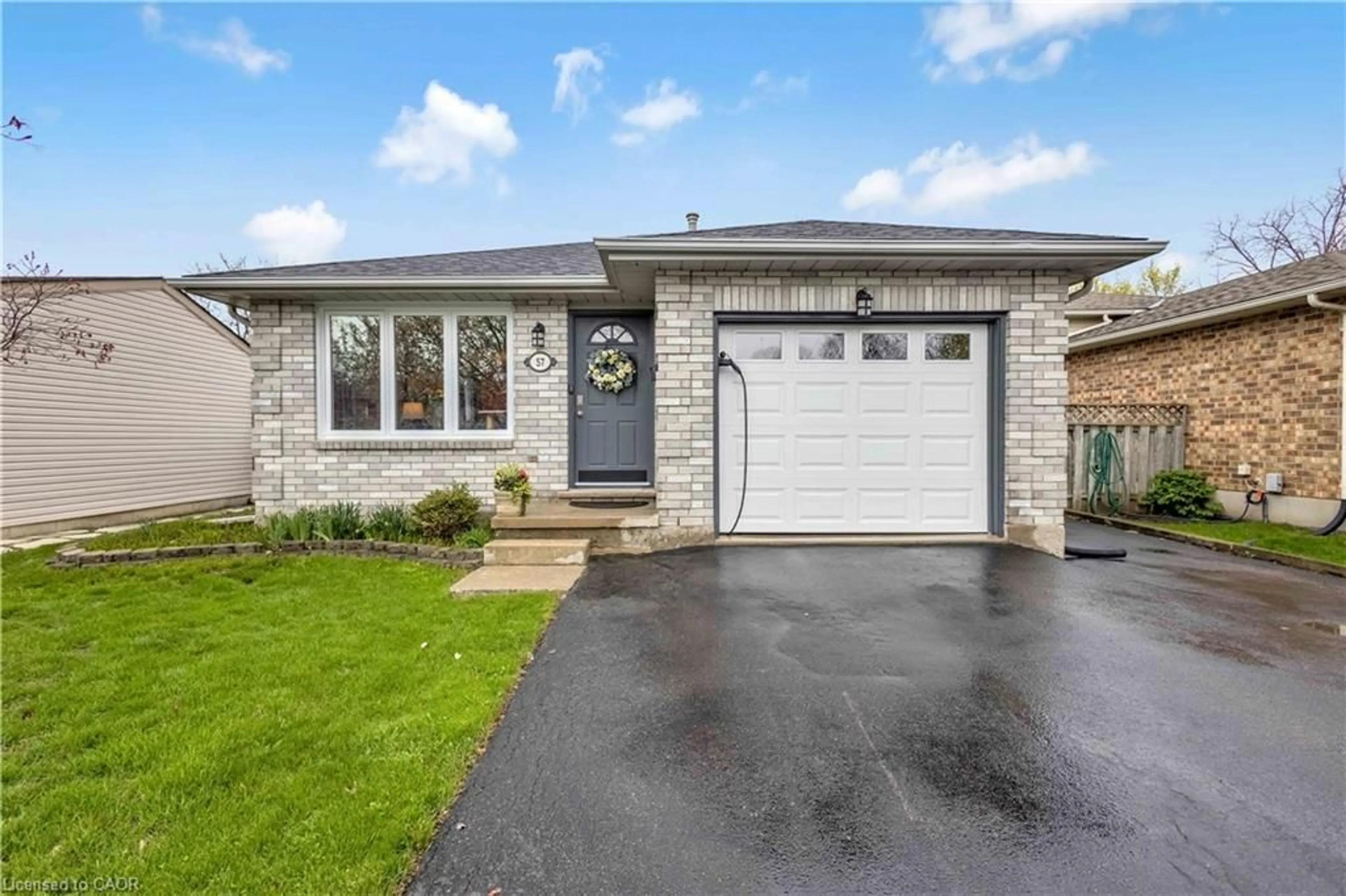 Home with brick exterior material, street for 57 Coxwell Cres, Brantford Ontario N3P 1P5