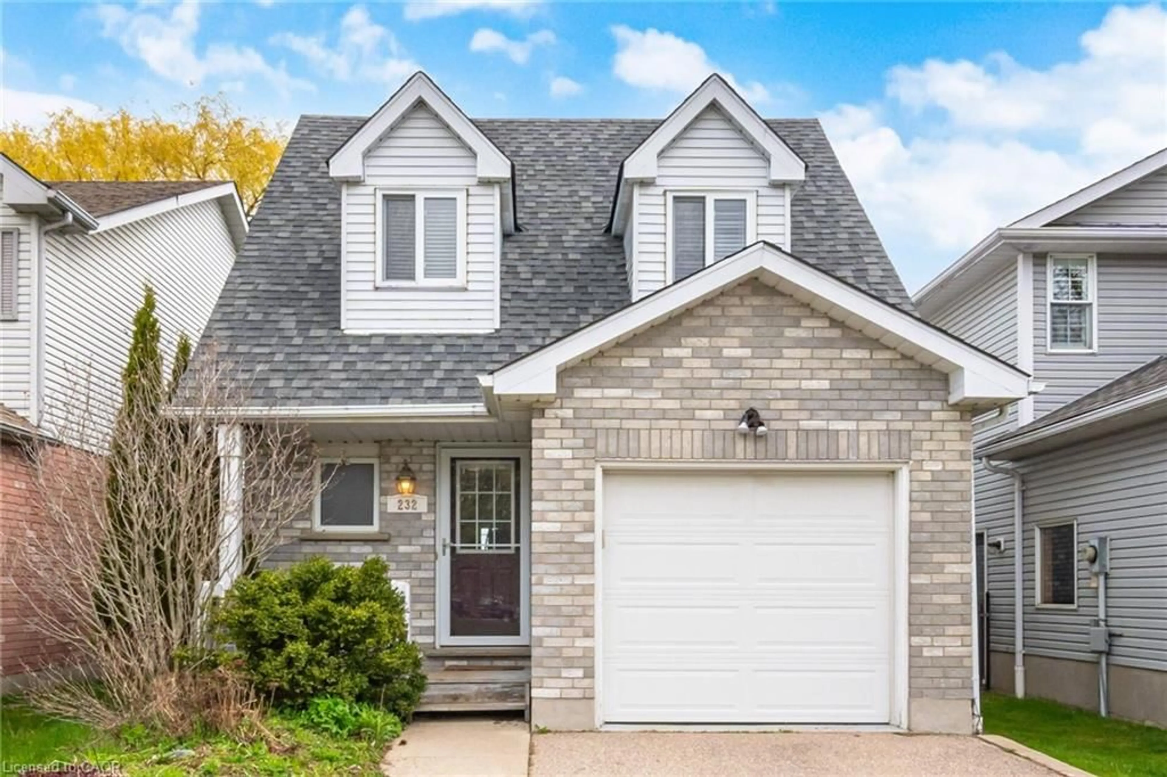 Home with brick exterior material, street for 232 Auburn Dr, Waterloo Ontario N2K 3T3
