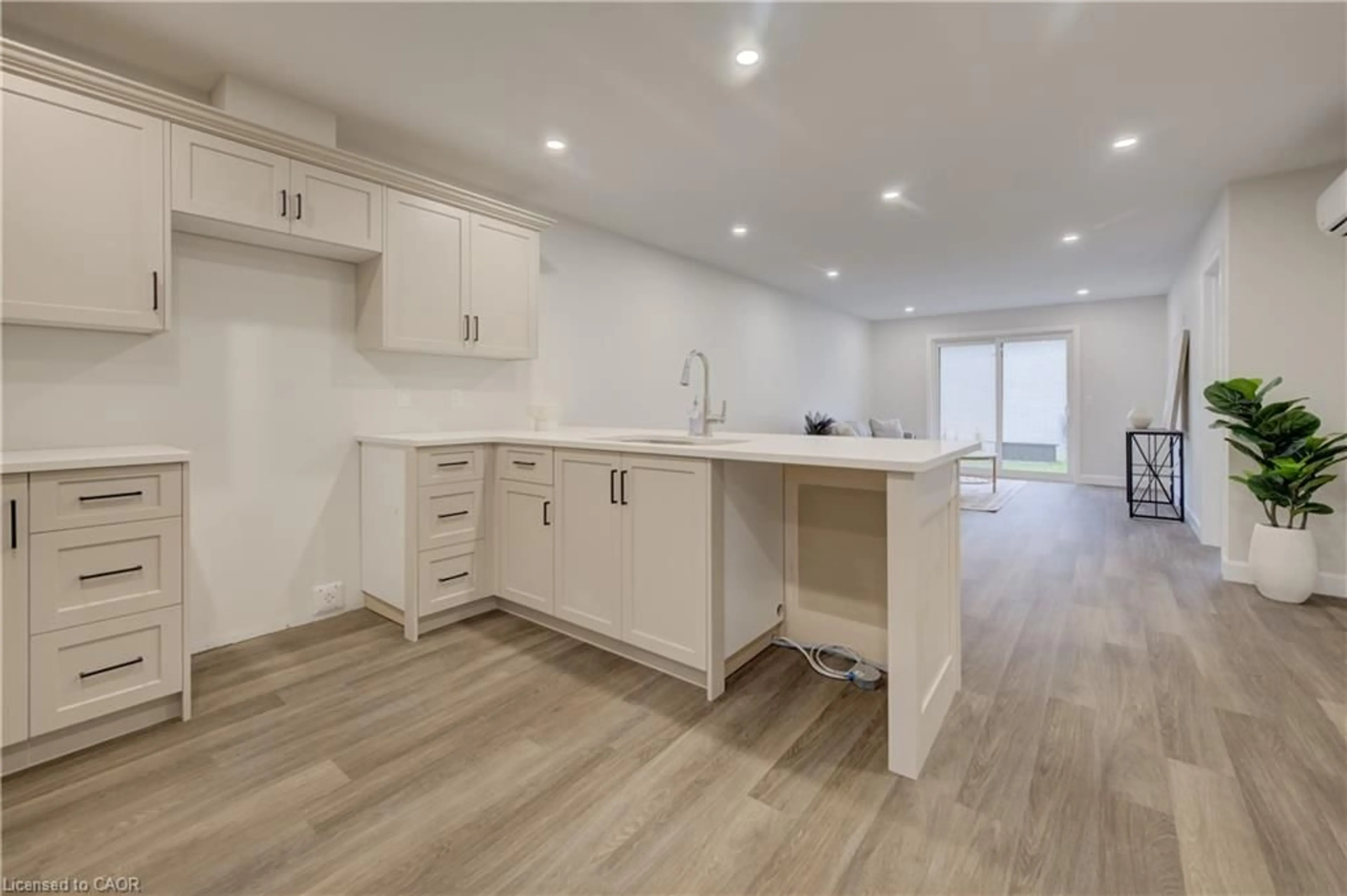 Open concept kitchen, wood/laminate floor for 202 Elgin St, Palmerston Ontario N0G 2P0