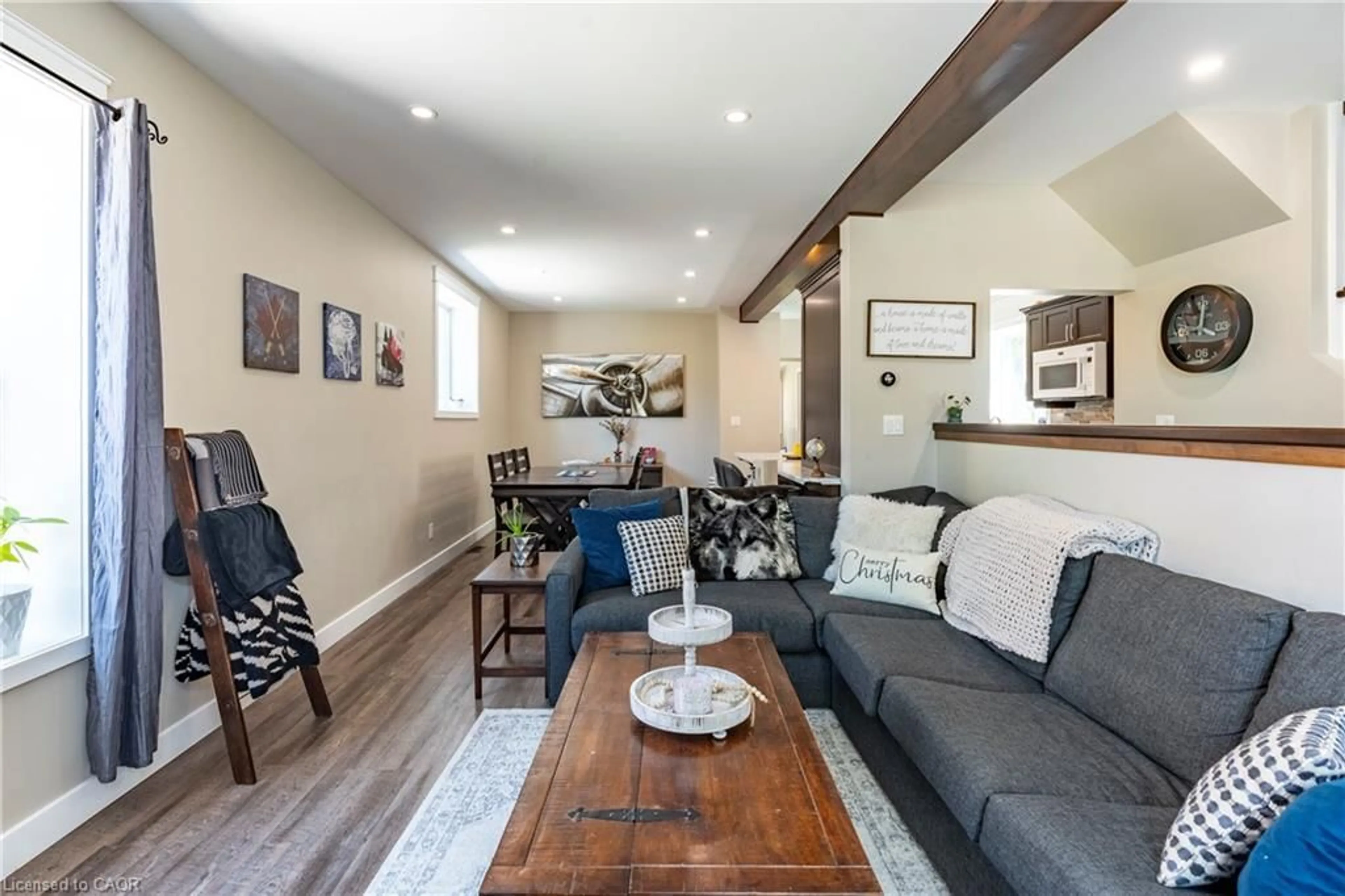 Living room with furniture, wood/laminate floor for 422 Lambton St, Durham Ontario N0G 1R0