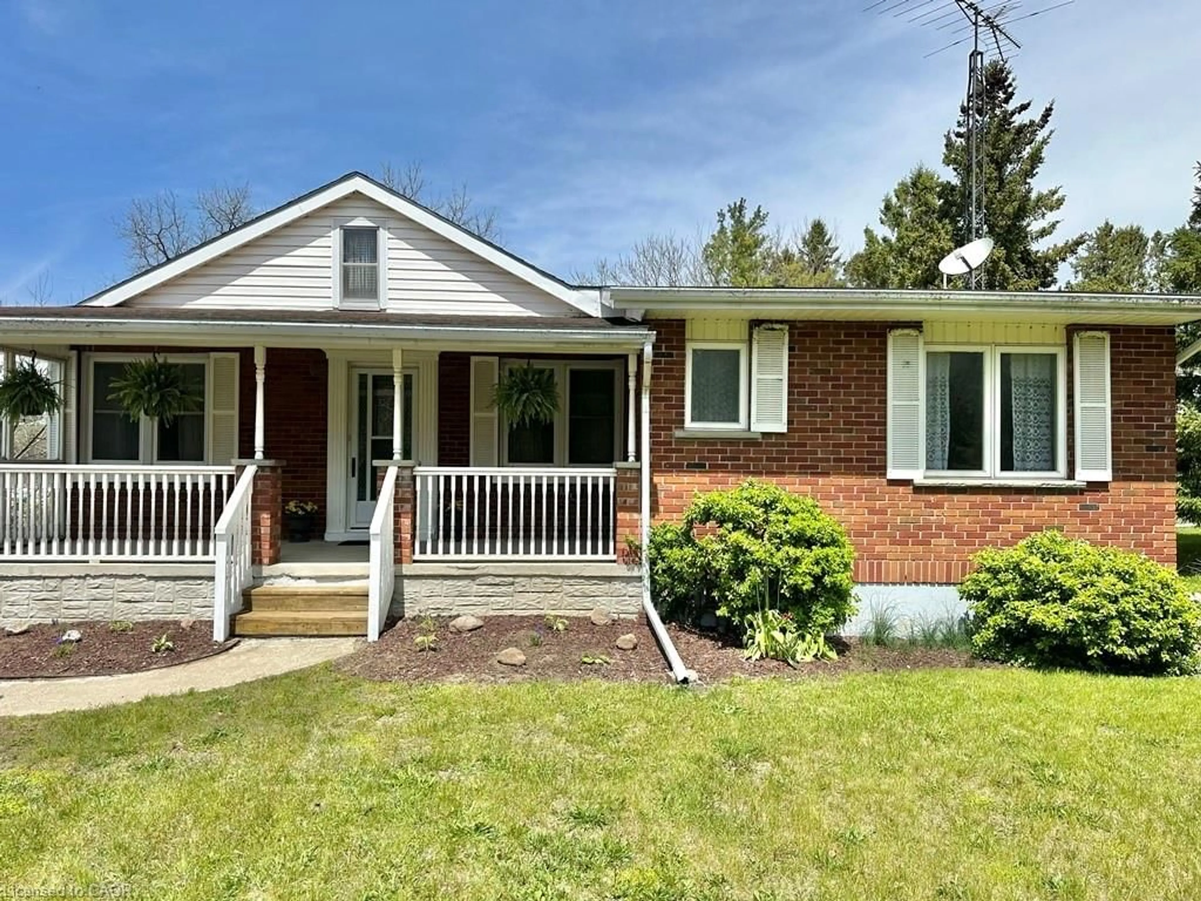Home with brick exterior material, street for 165 Highway 6, Simcoe Ontario N3Y 4K2