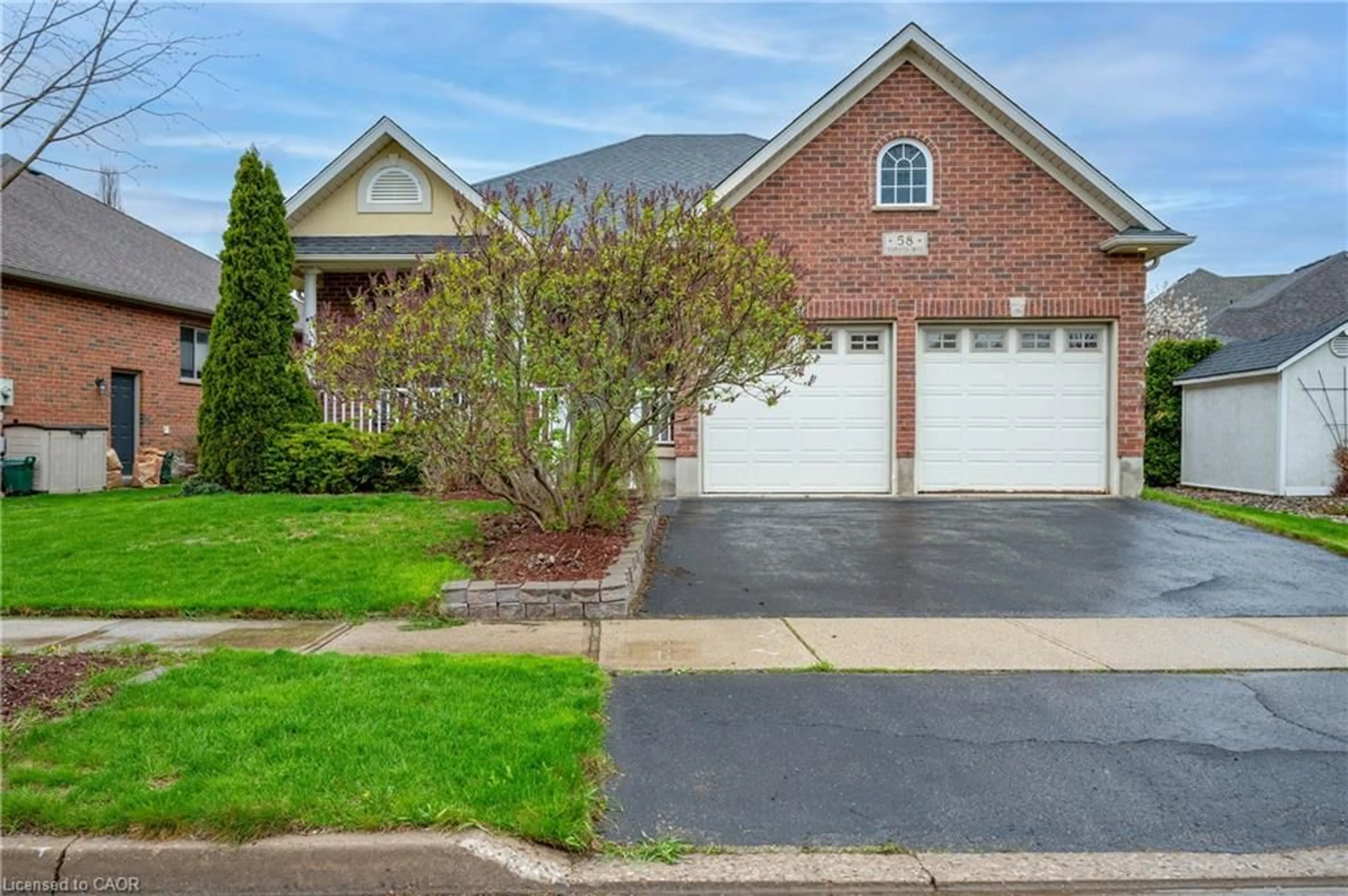 Home with brick exterior material, street for 58 Templeton Dr, Kitchener Ontario N2A 4G1