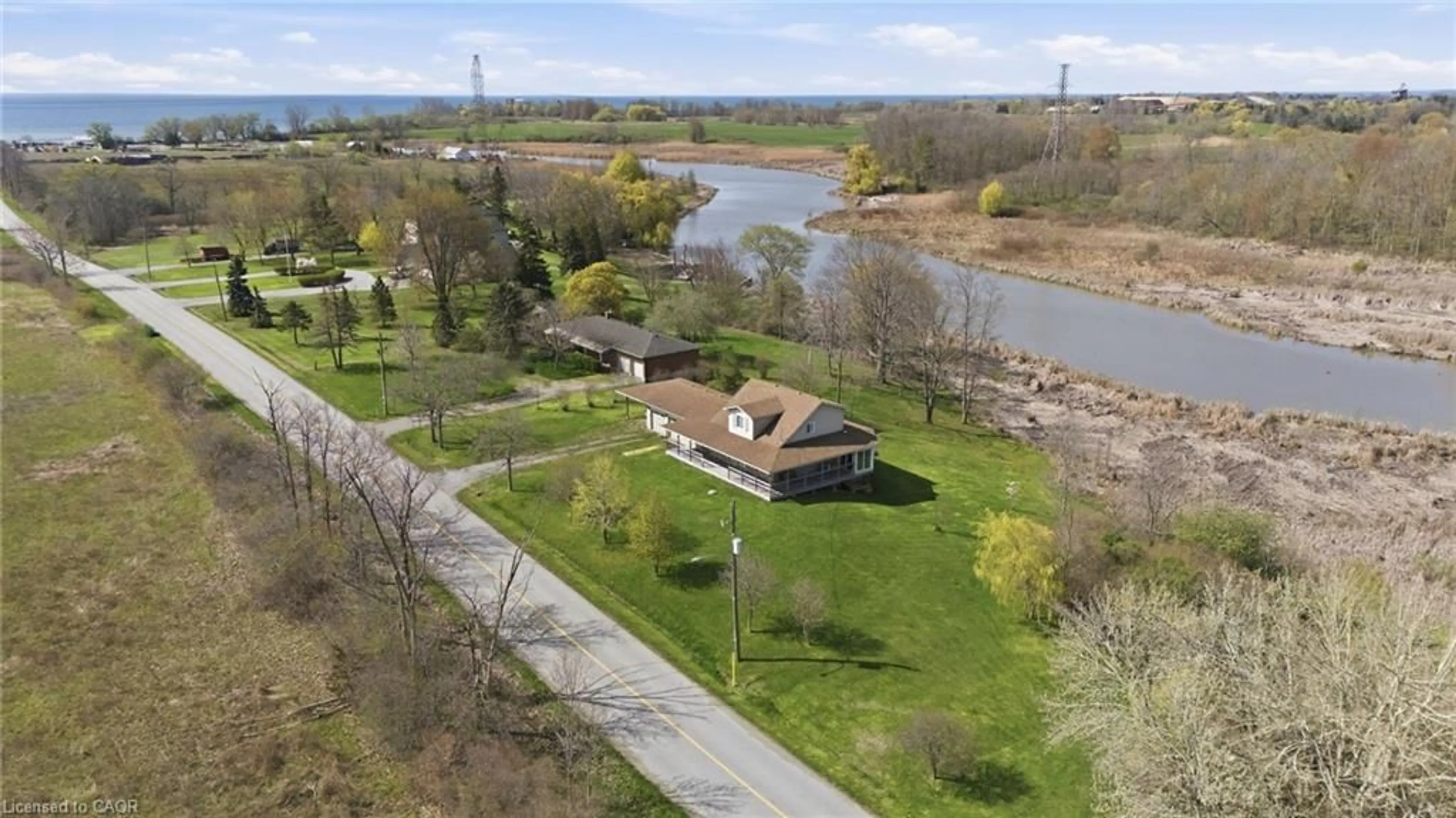 A pic from outside/outdoor area/front of a property/back of a property/a pic from drone, water/lake/river/ocean view for 111 Erie St, Nanticoke Ontario N0A 1P0