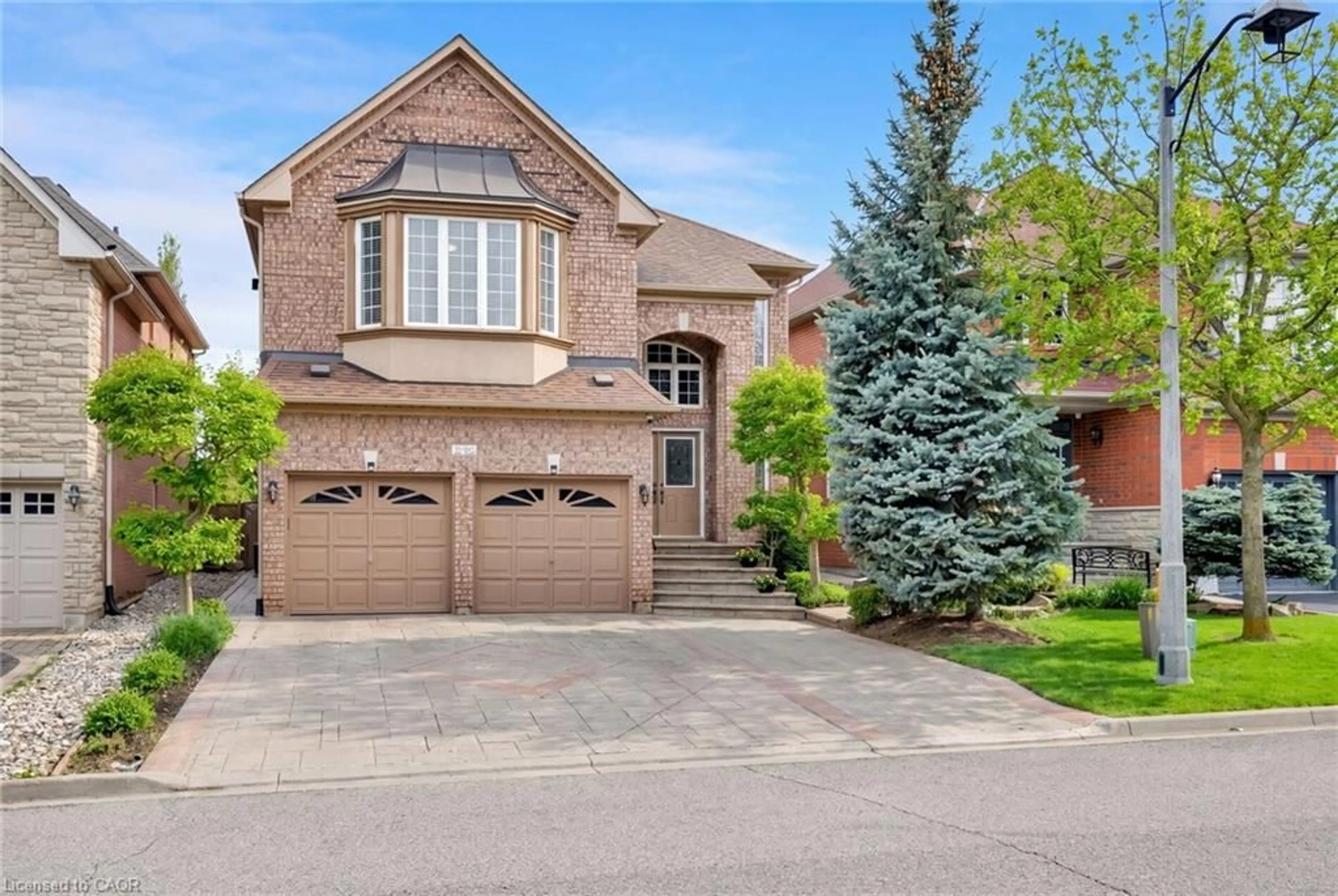 Home with brick exterior material, street for 2252 Foxfield Rd, Oakville Ontario L6M 4C5