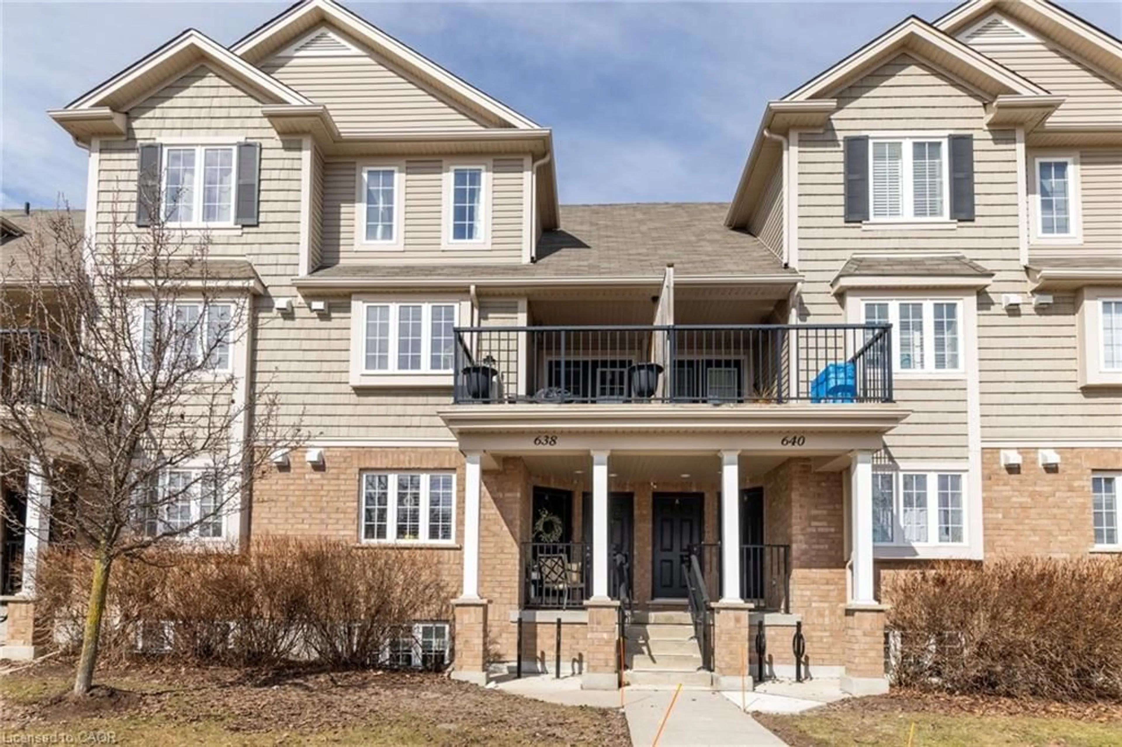 Home with brick exterior material, street for 638 Woodlawn Rd #B, Guelph Ontario N1E 0K4