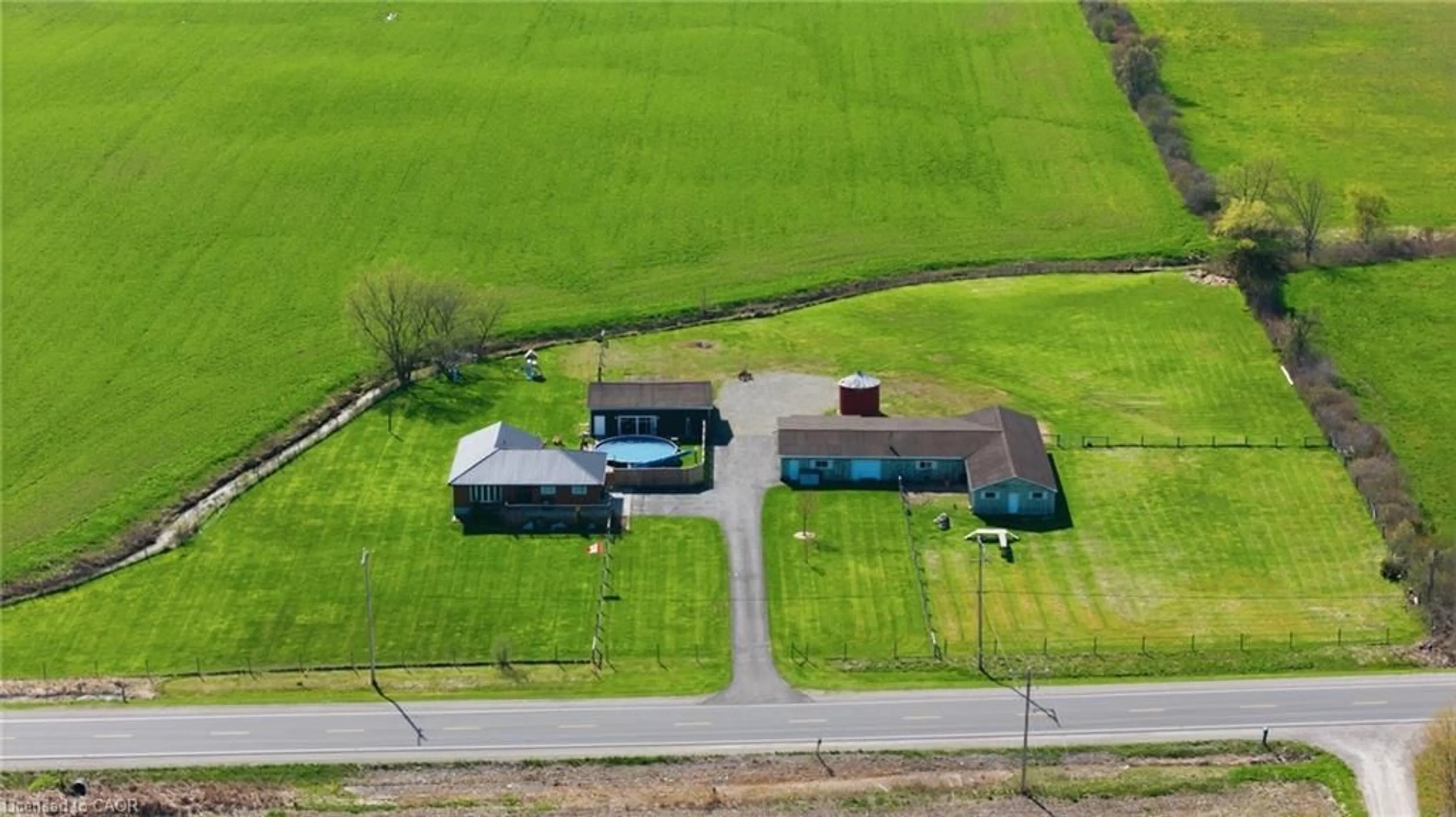 A pic from outside/outdoor area/front of a property/back of a property/a pic from drone, building for 7396 Highway 3, Dunnville Ontario N1A 2W1