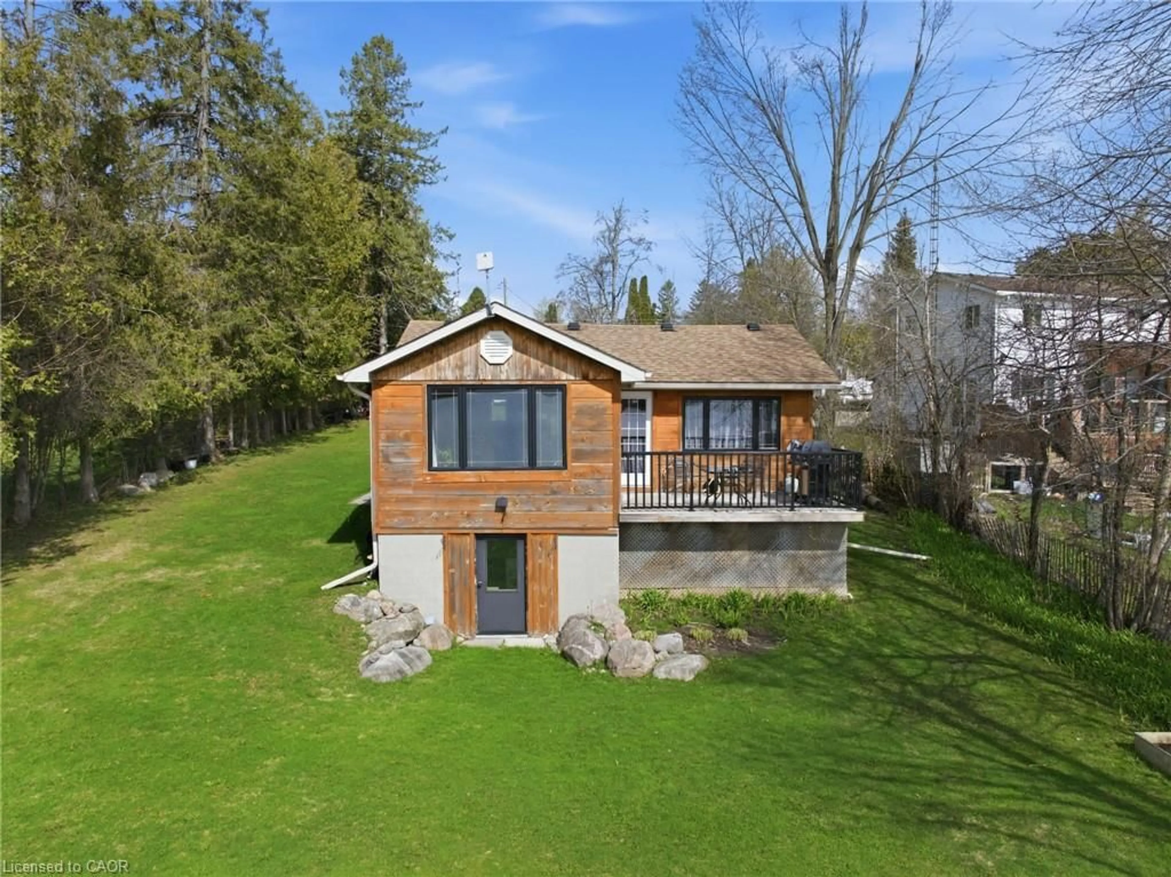A pic from outside/outdoor area/front of a property/back of a property/a pic from drone, water/lake/river/ocean view for 38 Cowans Cres, Omemee Ontario K0L 2W0