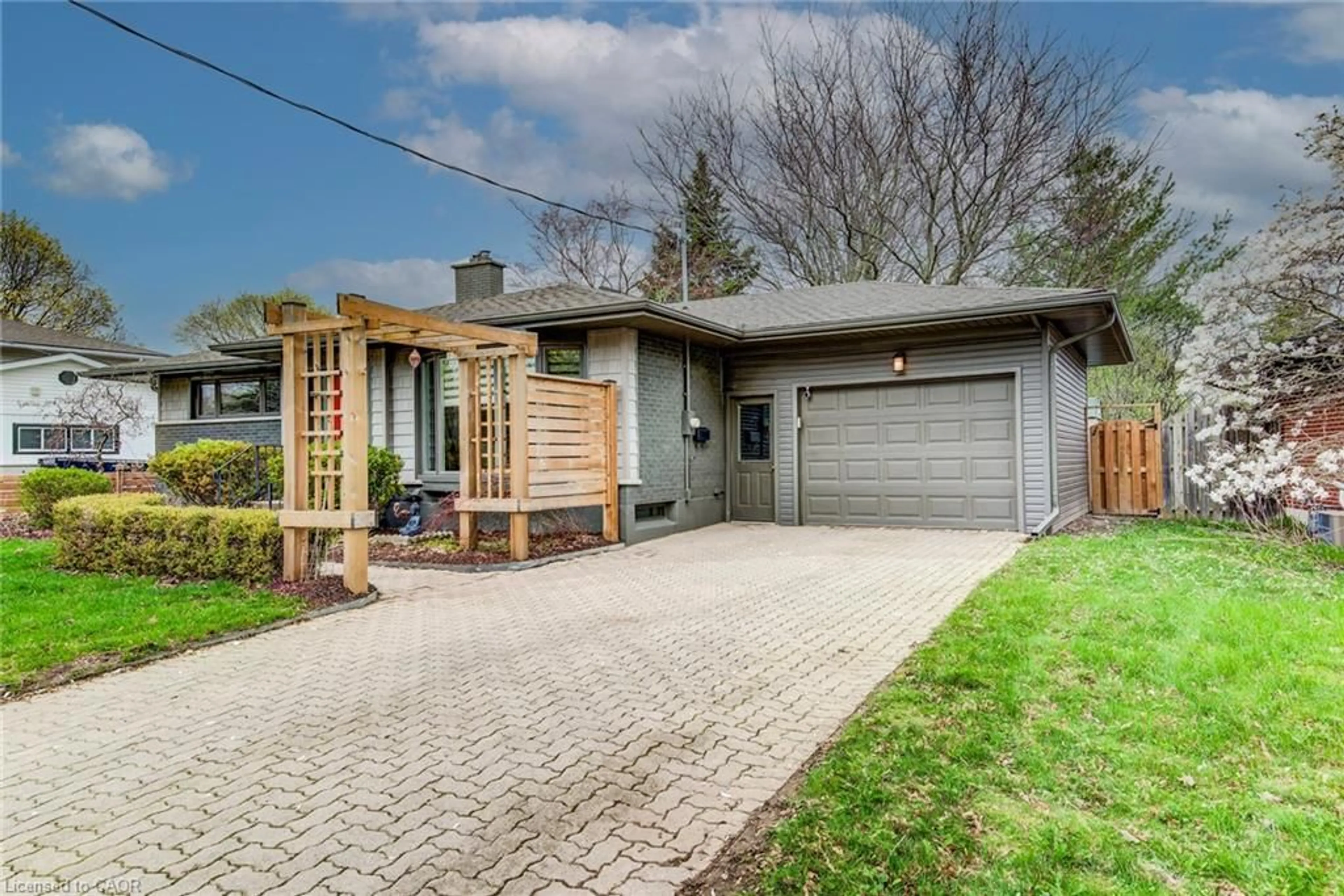 Home with brick exterior material, street for 14 Graystone Ave, Kitchener Ontario N2M 4T1