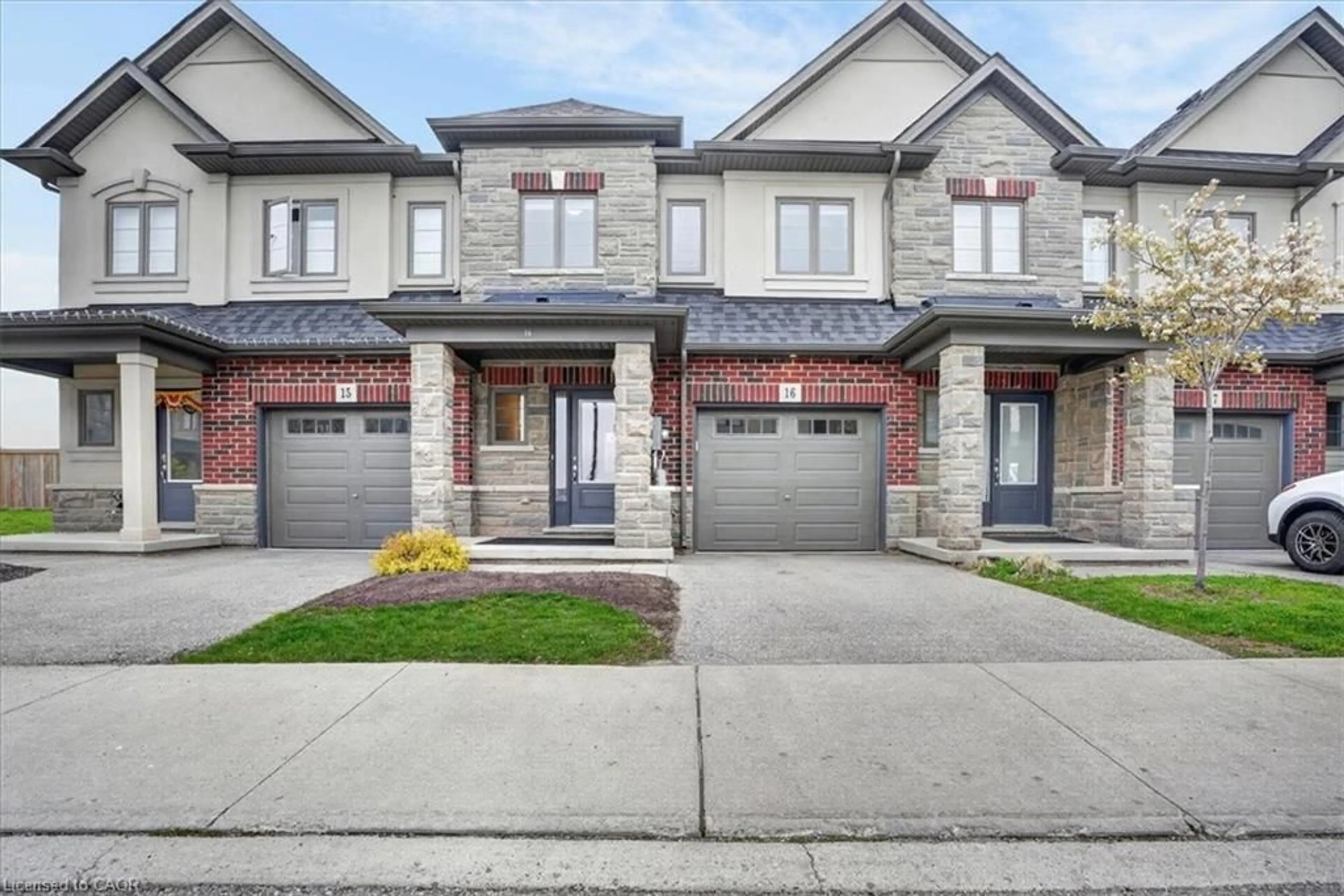 Home with brick exterior material, street for 324 Equestrian Way #16, Cambridge Ontario N3E 0E2