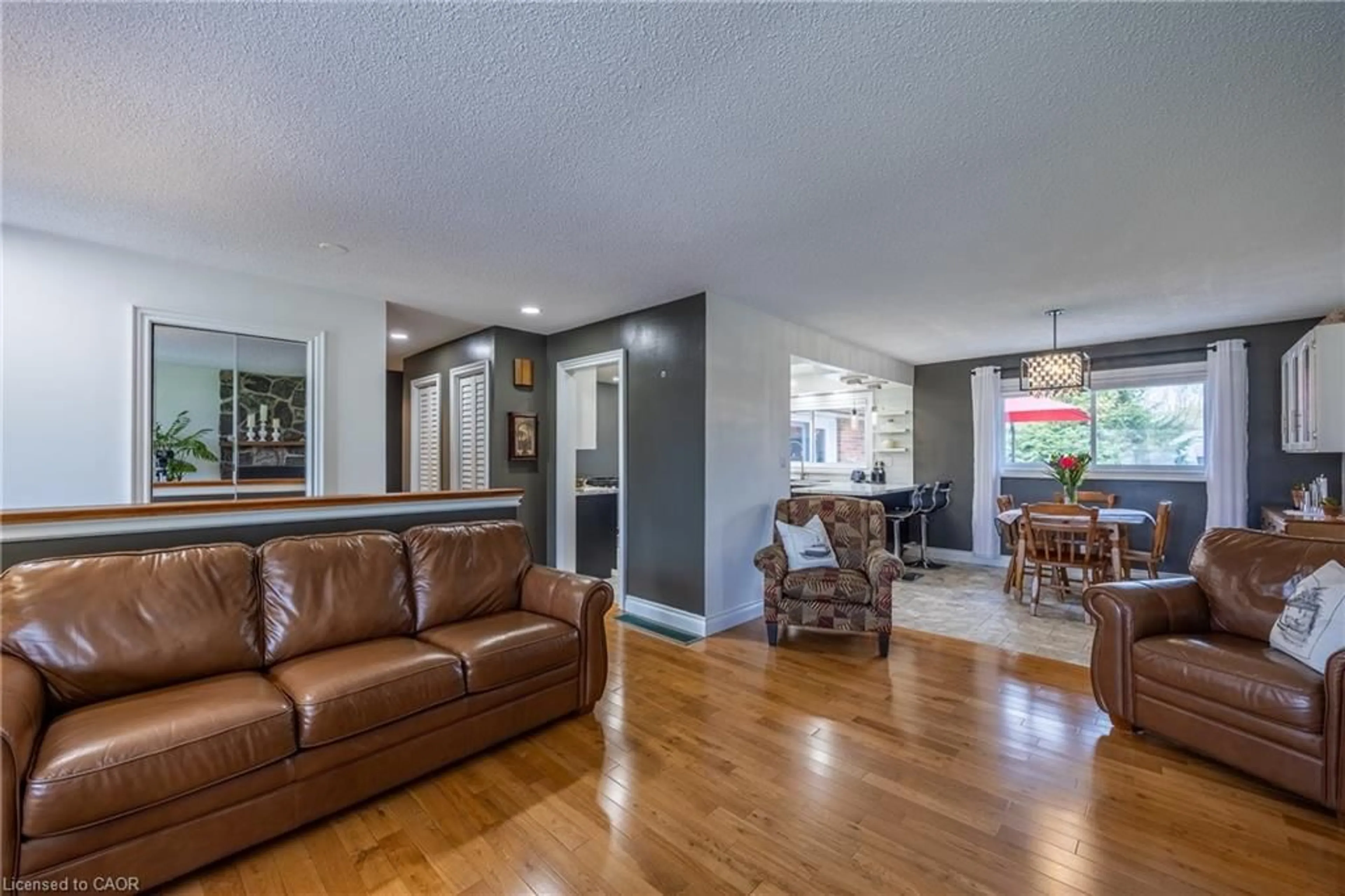 Living room with furniture, wood/laminate floor for 15 Ryerse Cres, Port Dover Ontario N0A 1N6