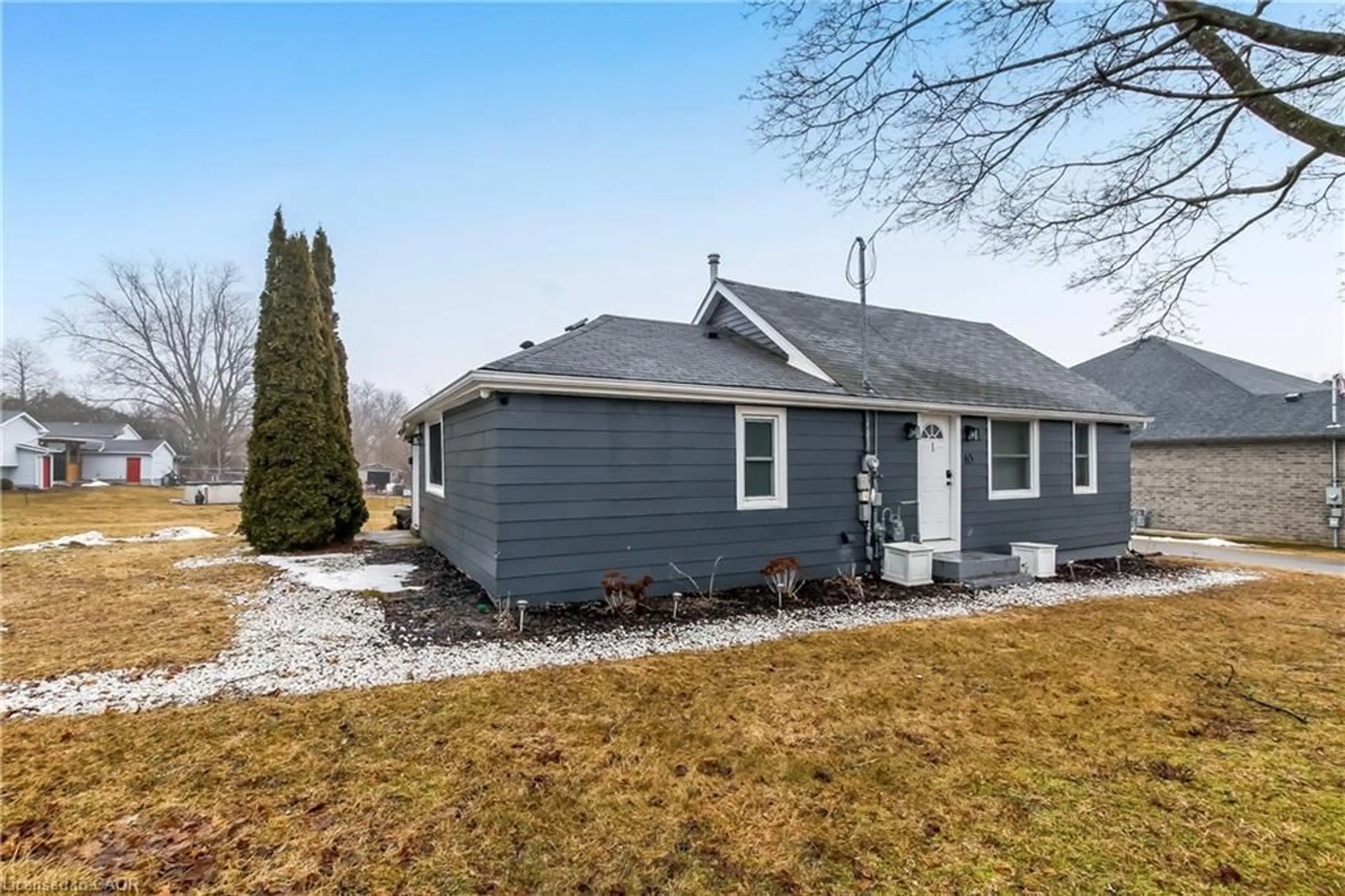 Home with vinyl exterior material, street for 65 Norfolk St, Waterford Ontario N0E 1Y0