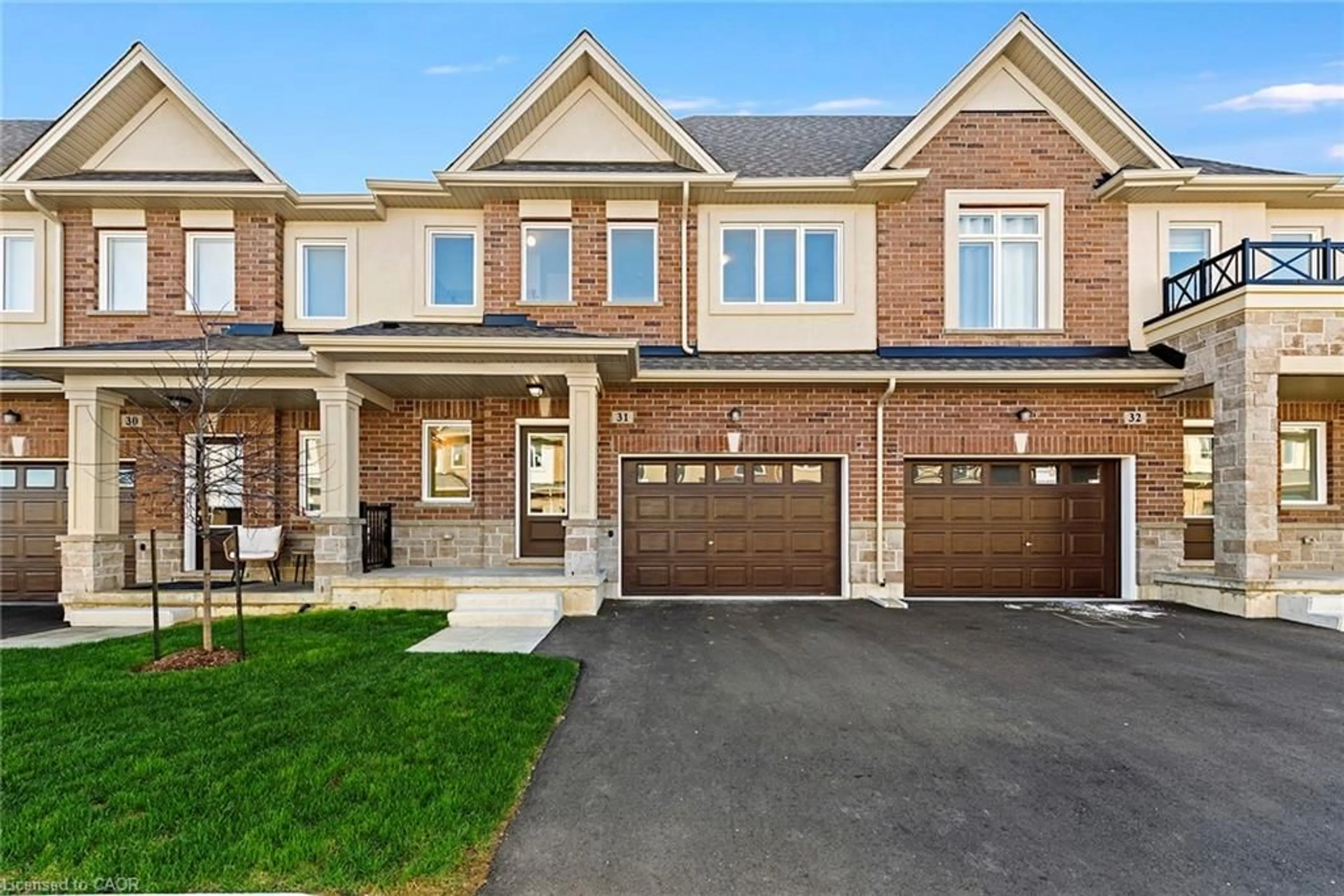 Home with brick exterior material, street for 205 Thames Way #31, Hamilton Ontario L0R 1W2