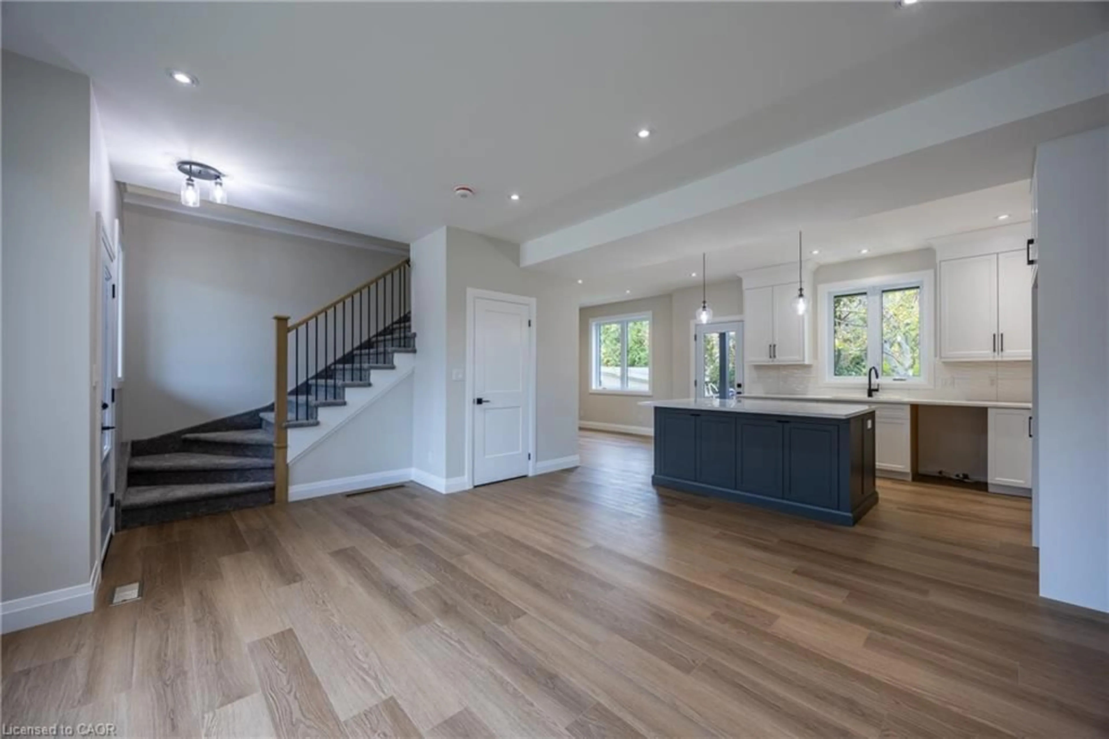 Open concept kitchen, wood/laminate floor for 5 Maple Ave, Port Dover Ontario N0A 1N6