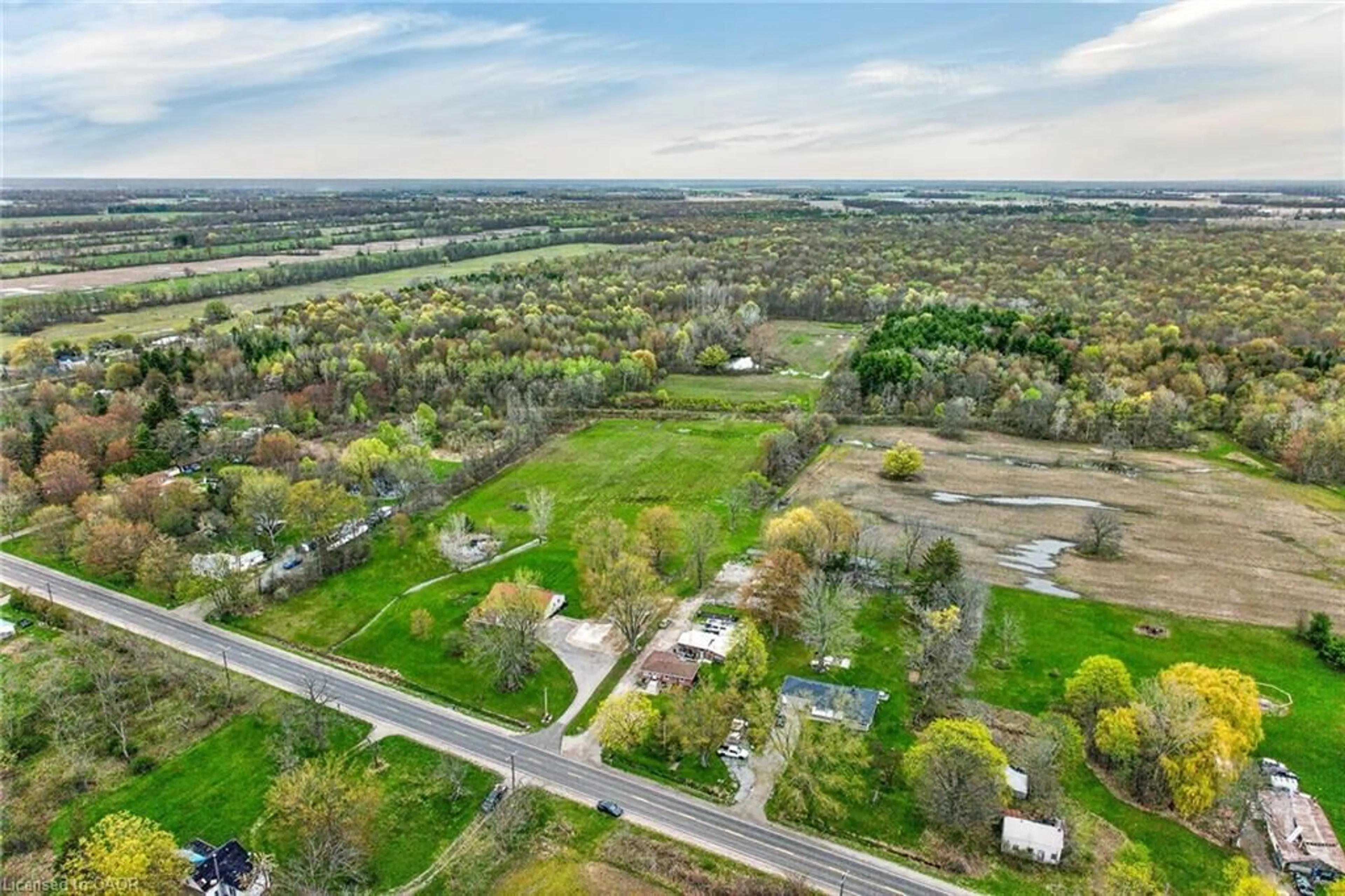 A pic from outside/outdoor area/front of a property/back of a property/a pic from drone, unknown for 8151 Highway 3, Dunnville Ontario N1A 2W4