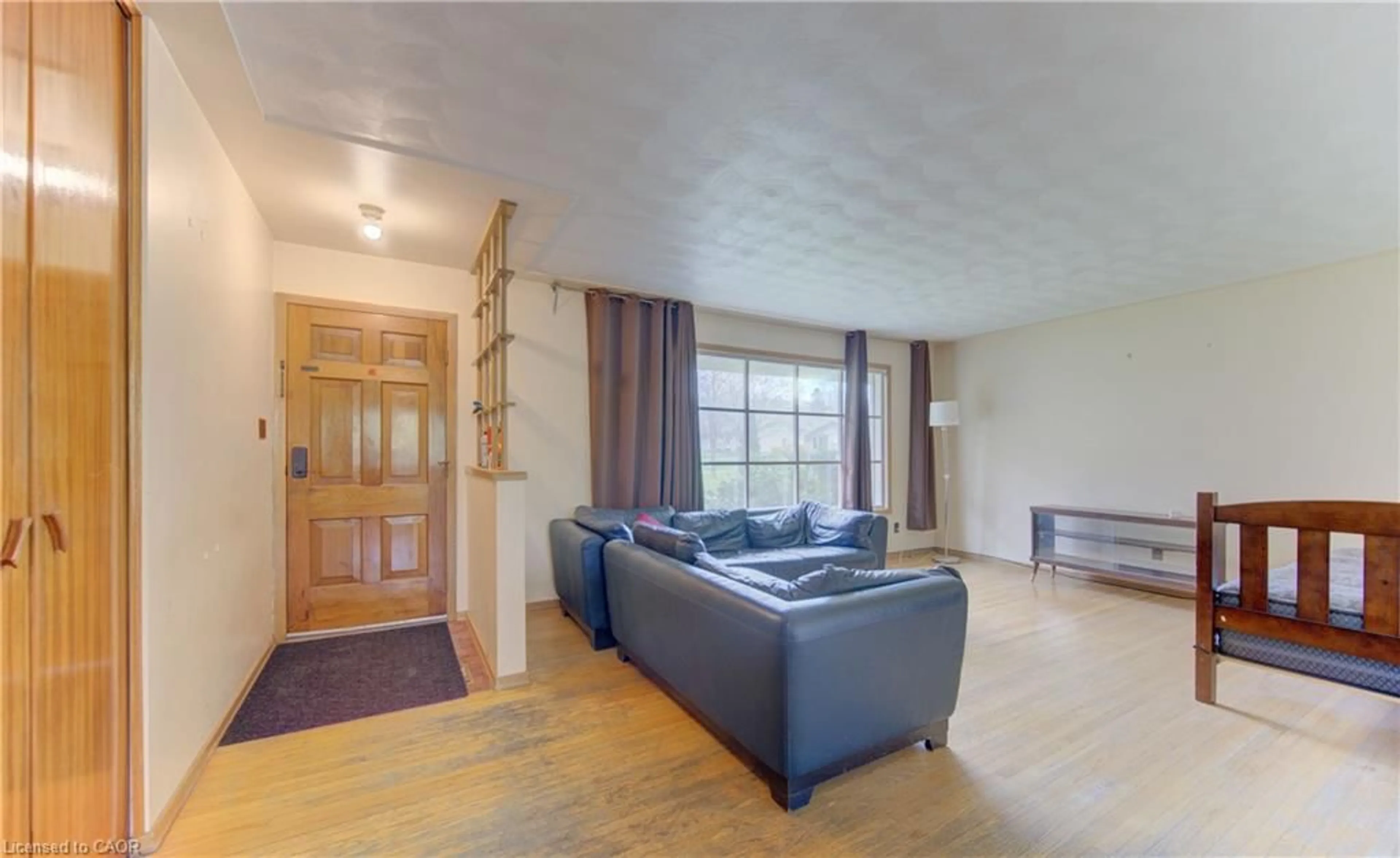 Living room with furniture, wood/laminate floor for 259 Willowdale Pl, Waterloo Ontario N2J 3M5