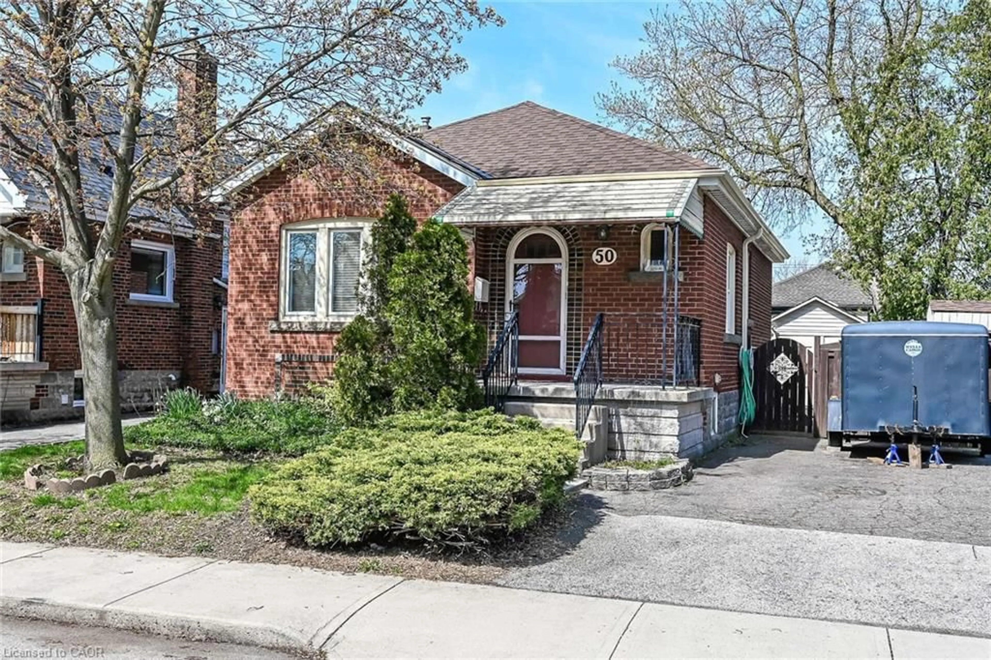 Home with brick exterior material, street for 50 East 12th St, Hamilton Ontario L9A 3X1