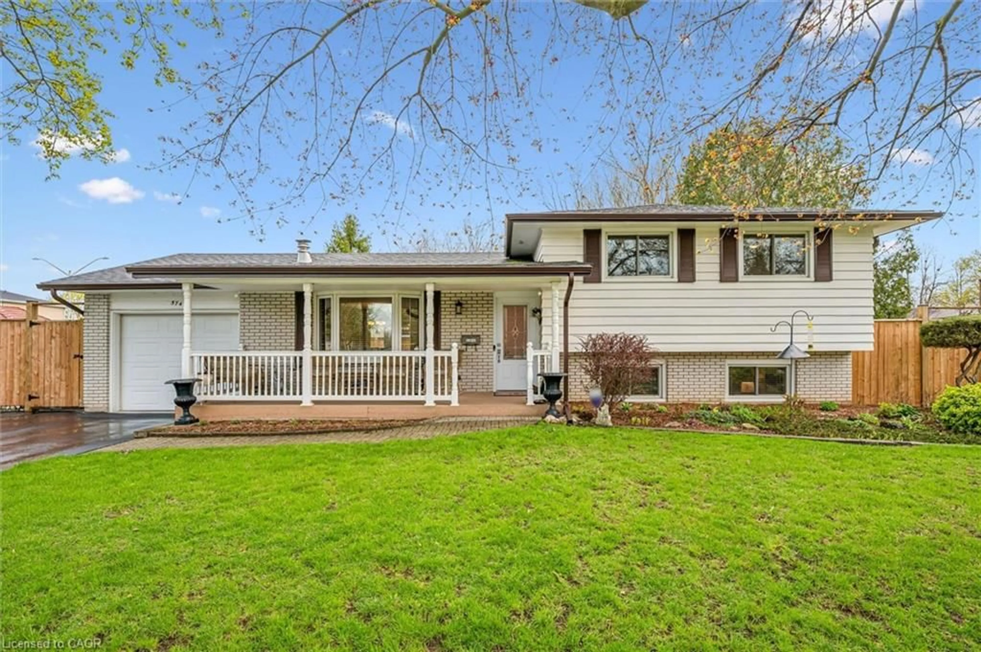 Home with vinyl exterior material, street for 574 Sprucehill Ave, Waterloo Ontario N2L 4V9