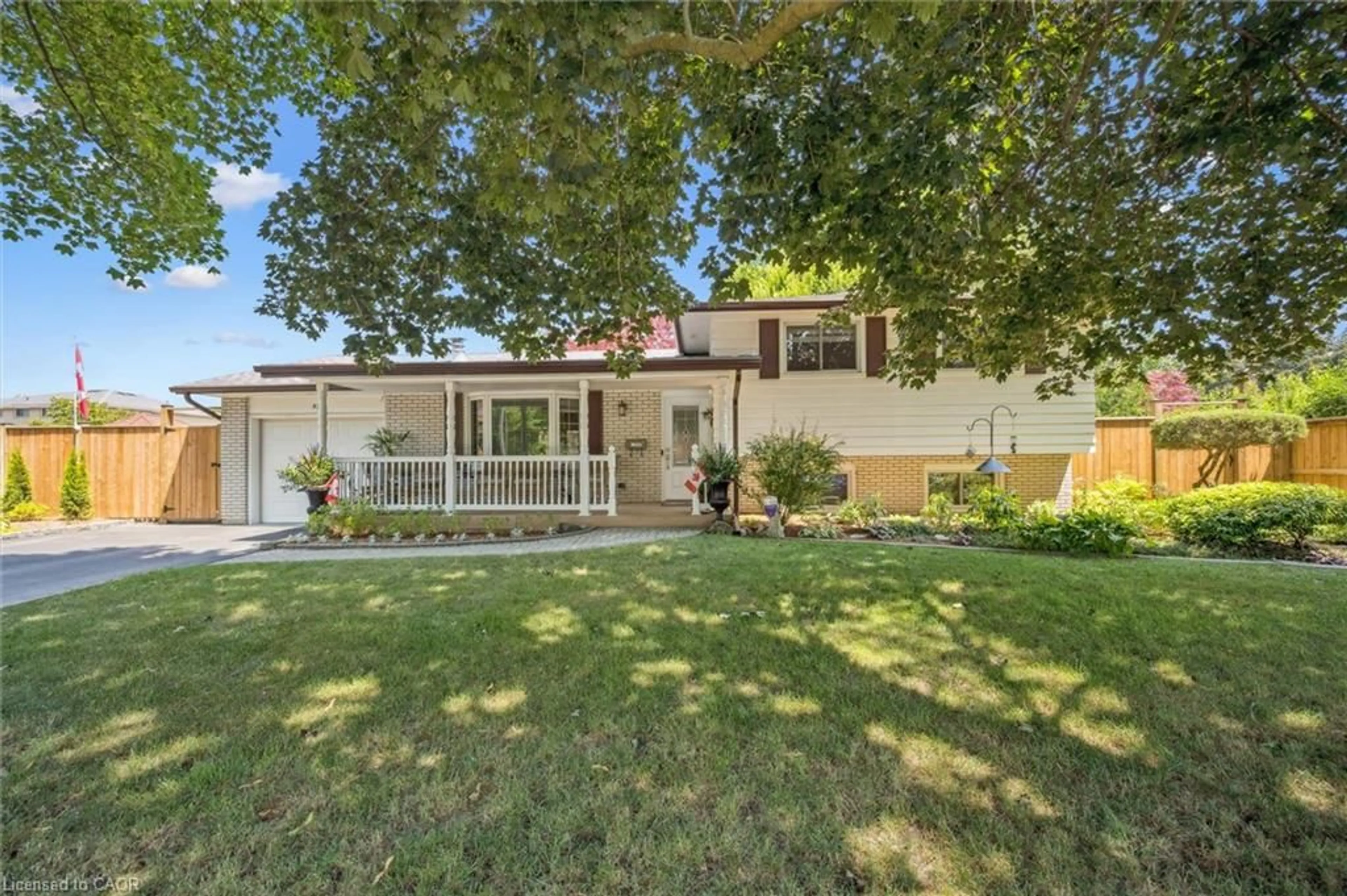 Home with vinyl exterior material, street for 574 Sprucehill Ave, Waterloo Ontario N2L 4V9