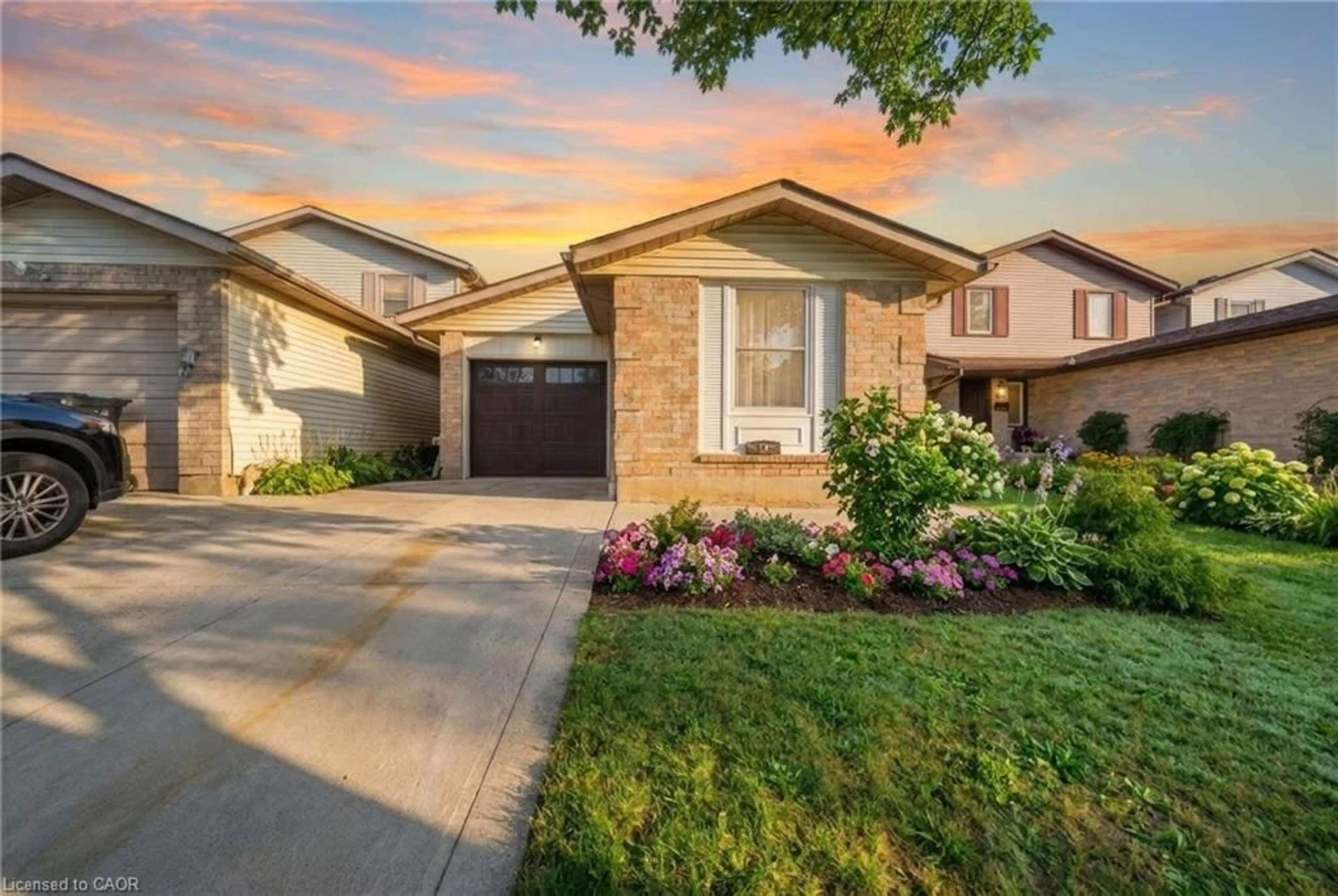 Home with brick exterior material, street for 58 Leacock Ave, Guelph Ontario N1E 6R1