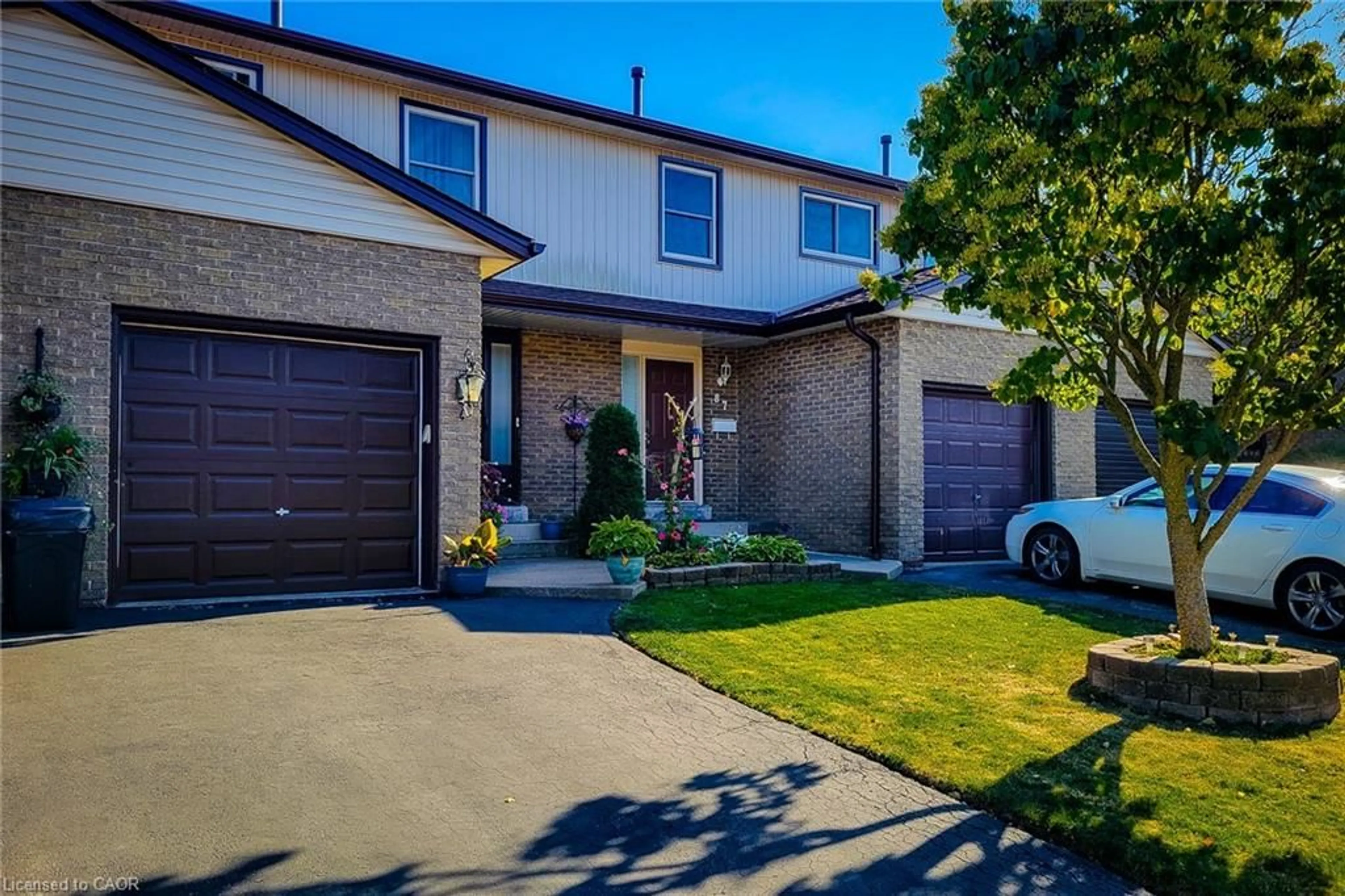 Home with brick exterior material, street for 1115 Paramount Dr #88, Stoney Creek Ontario L8J 1P6