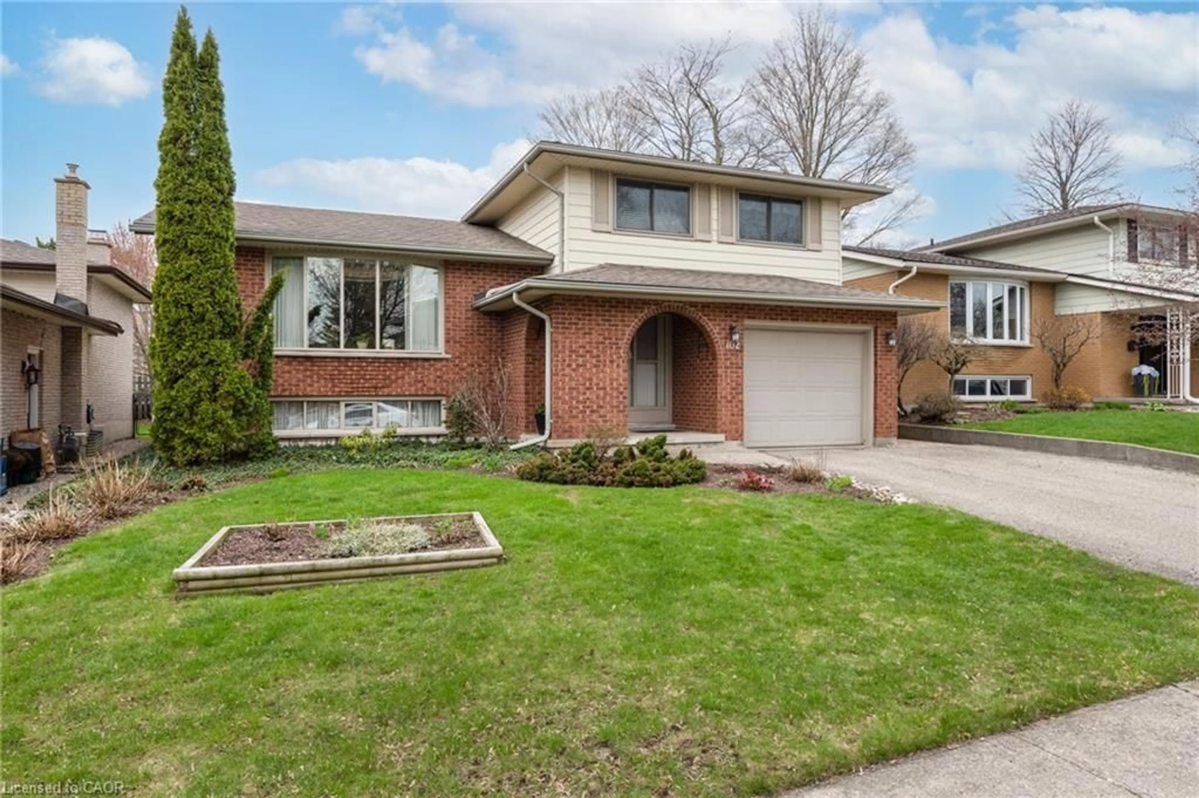 Home with brick exterior material, street for 102 Ripley Cres, Kitchener Ontario N2N 1V4