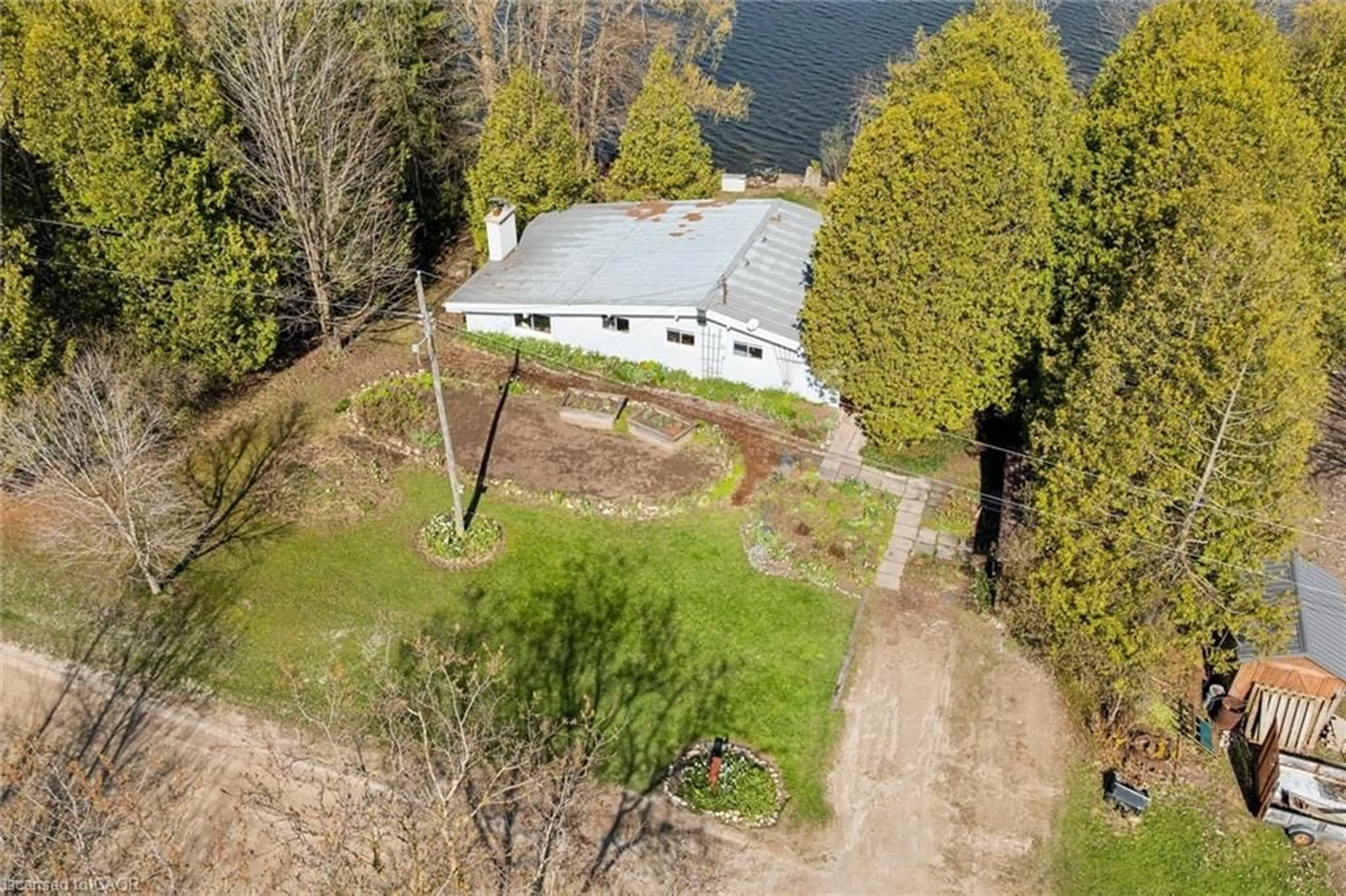 A pic from outside/outdoor area/front of a property/back of a property/a pic from drone, water/lake/river/ocean view for 68 Dankert Lake Rd, Brockton Ontario N0G 1S0