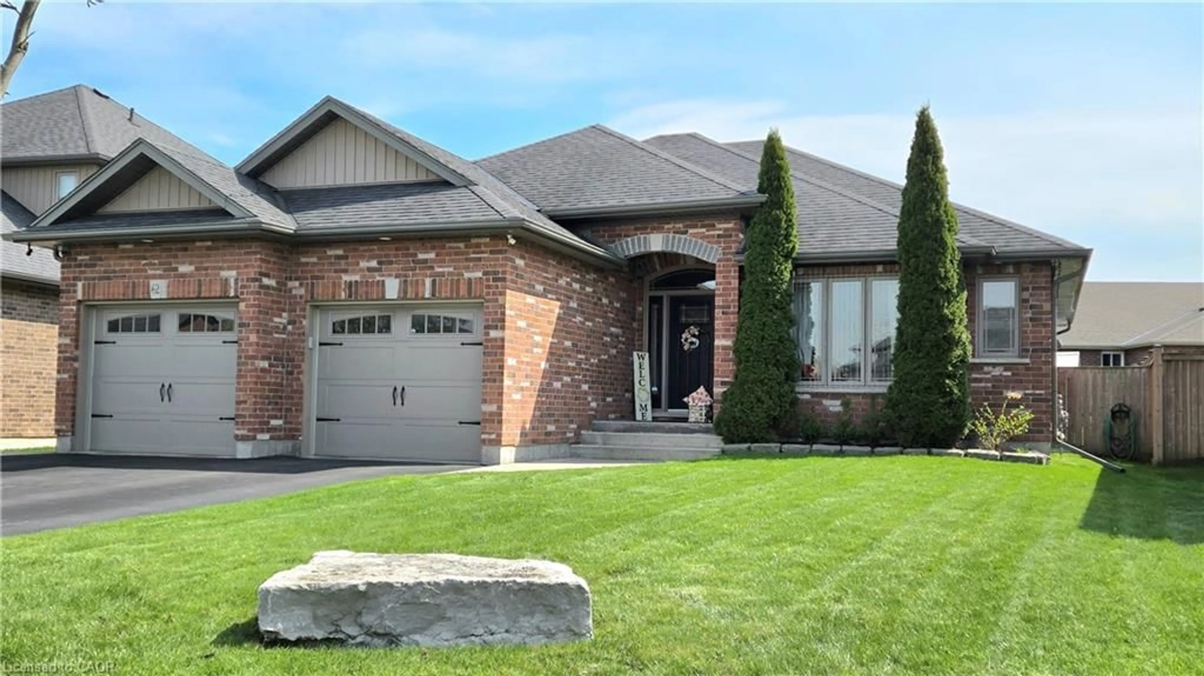 Home with brick exterior material, street for 62 Driftwood Dr, Simcoe Ontario N3Y 0B4