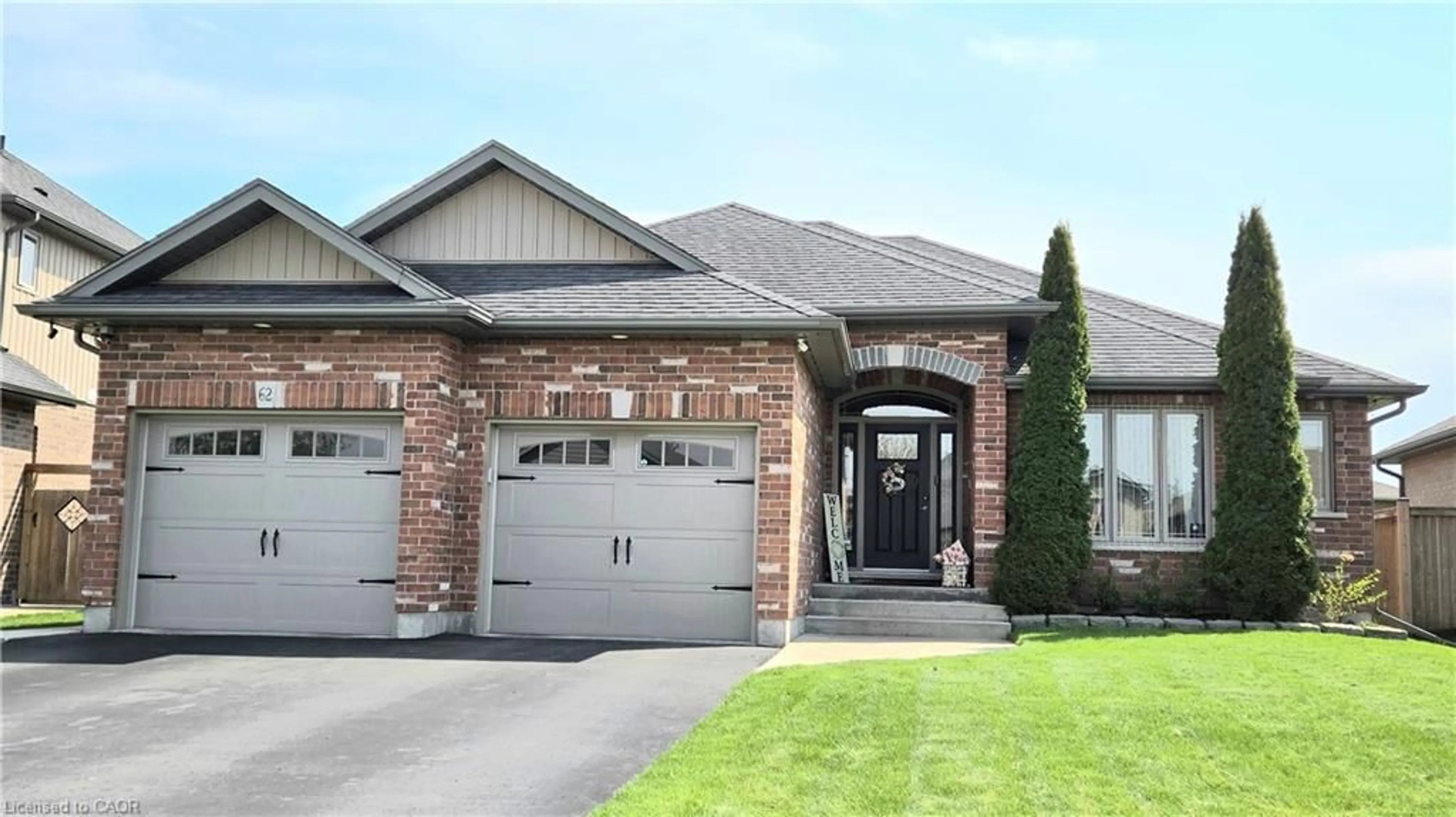 Home with brick exterior material, street for 62 Driftwood Dr, Simcoe Ontario N3Y 0B4