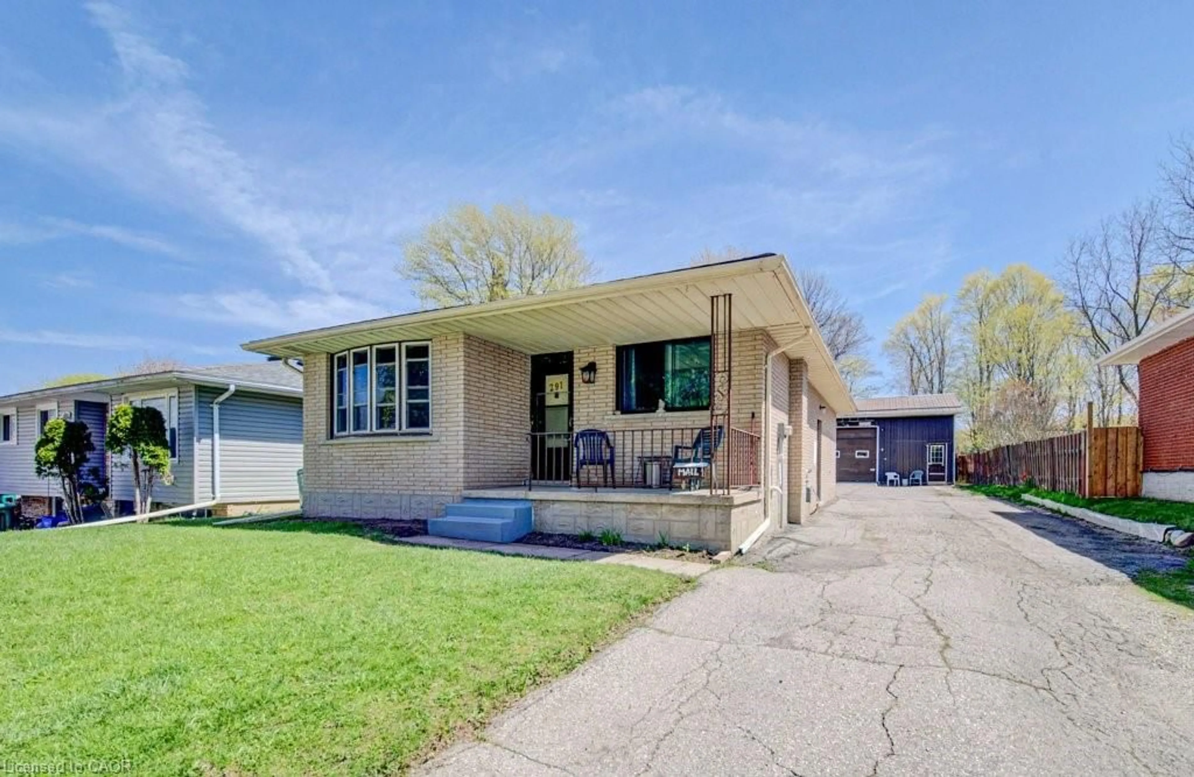 Home with brick exterior material, street for 291 Westwood Dr, Kitchener Ontario N2M 2L3